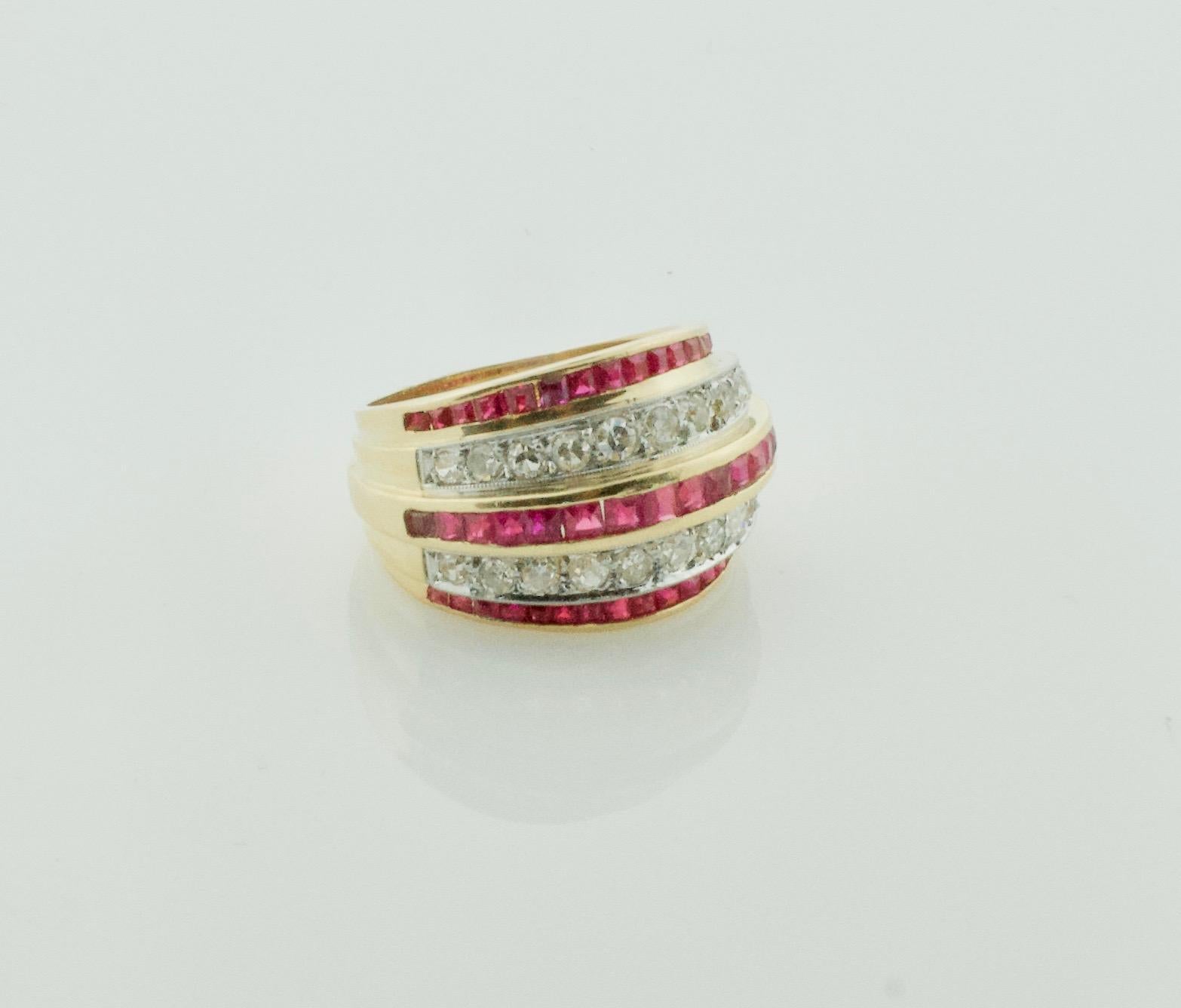 Art Deco Diamond and Ruby Ring/Wedding Band in Rose Gold and Platinum 
Twenty Two Round Cut Diamonds Weighing .55 Carats Approximately 
Fifty Six Calibrated Rubies Weighing 1.50 Carats Approximately 
Currently Size 6.5 Can Easily Sized By Us or Your