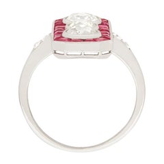 Art Deco Diamond and Ruby Three-Stone Halo Ring, circa 1920s