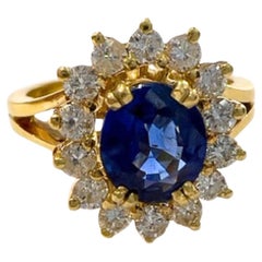 Anello Art Deco con diamanti e zaffiri in oro giallo 18K