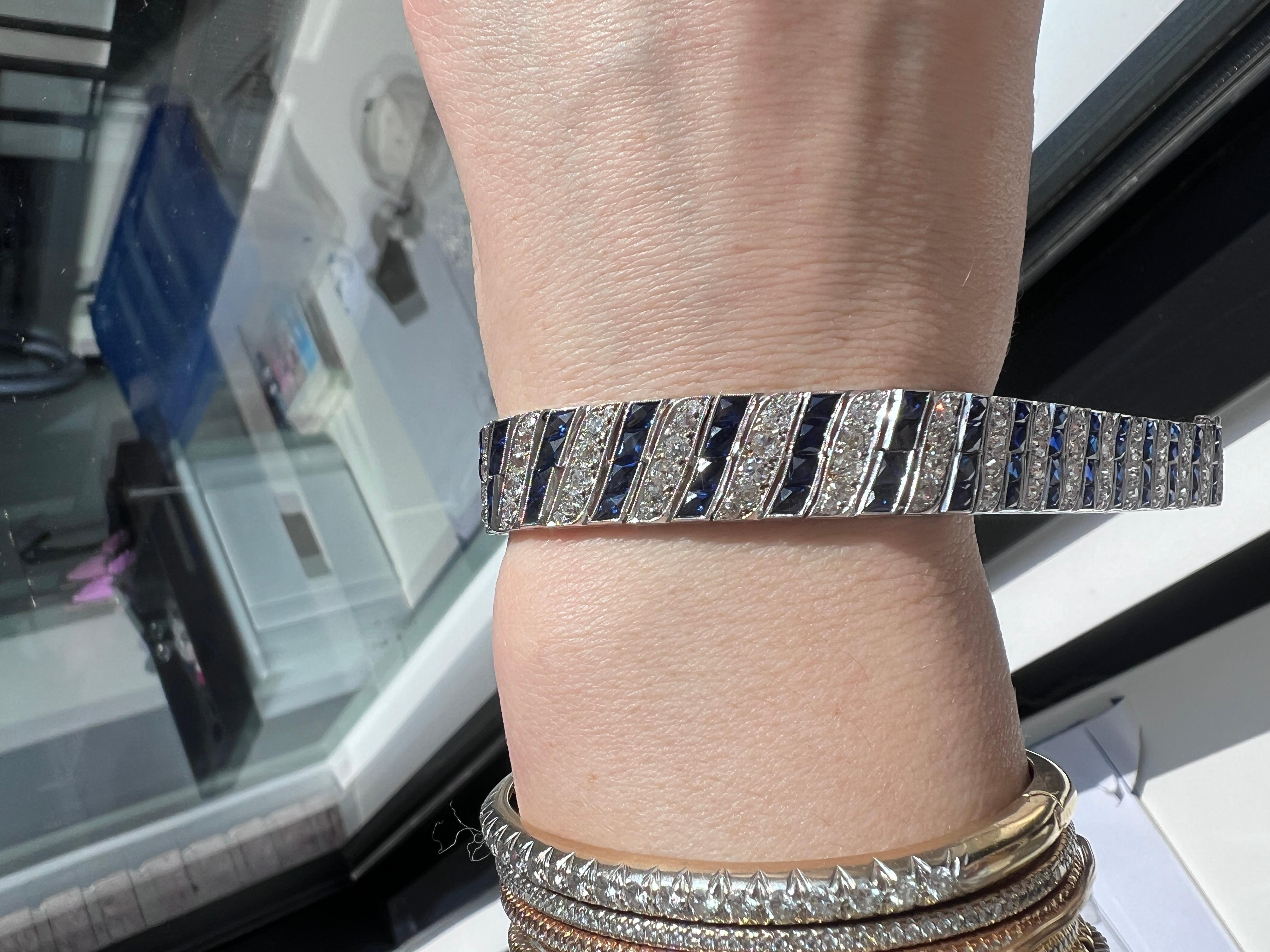 Art Deco Diamond and Sapphire Barberpole Platinum Filigree Tennis Link Bracelet For Sale 10