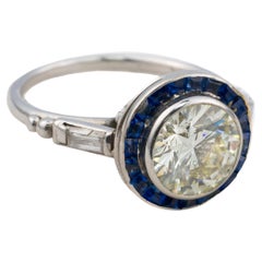 Anello aureola con diamante e zaffiro Art Deco
