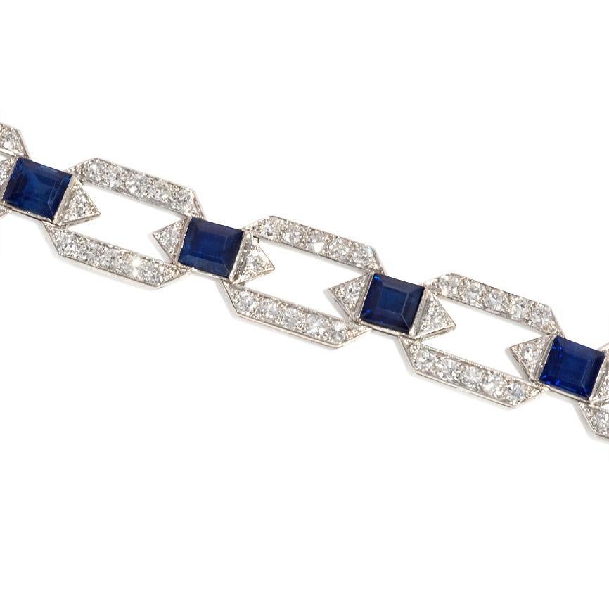 An Art Deco diamond and sapphire bracelet designed as open hexagonal links with sapphire and diamond spacers, in platinum.  Atw sapphires 9.50cts, atw diamonds 3.25 cts.  In beautiful condition