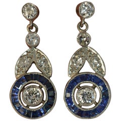 Diamond and Sapphire Platinum and 14 Carat Gold Drop Dangle Halo Earrings