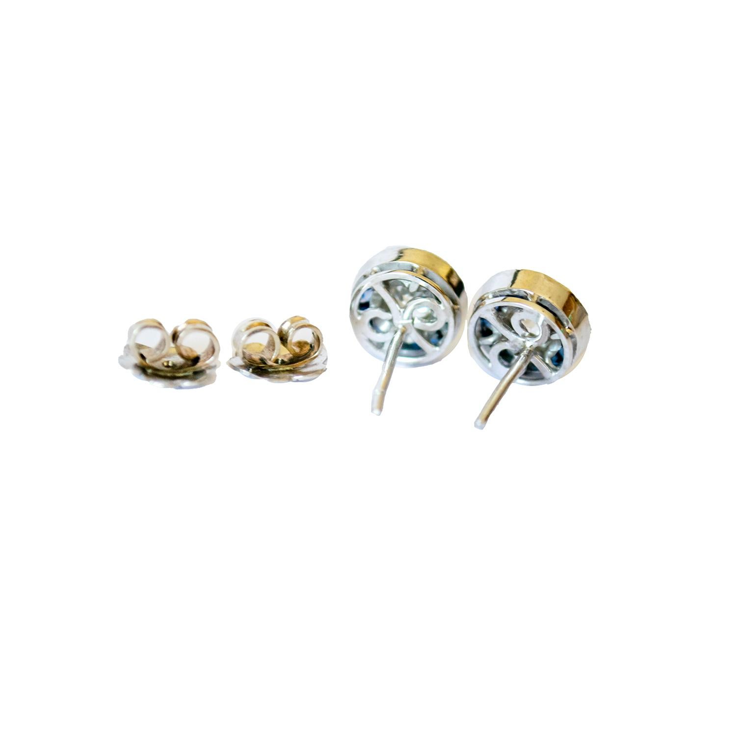 These Art Deco-style earrings are crafted in platinum 950 and feature diamonds and sapphires. 
They have a combined weight of 4.30 grams. 
The earrings are adorned with 2 old-cut diamonds, totaling 0.83 carats, with VS-SI clarity and H-I color.