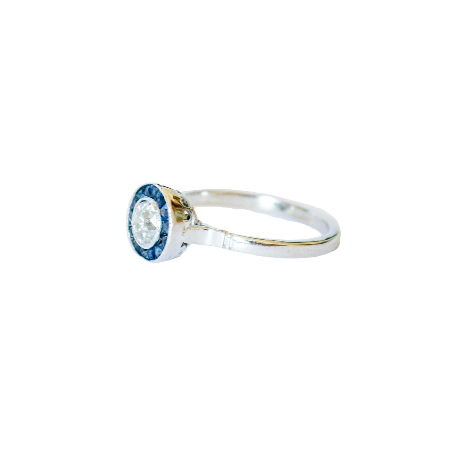 Trapezoid Cut 0.56 carat Diamond and 0.86 carat Sapphire Platinum Cocktail Ring For Sale