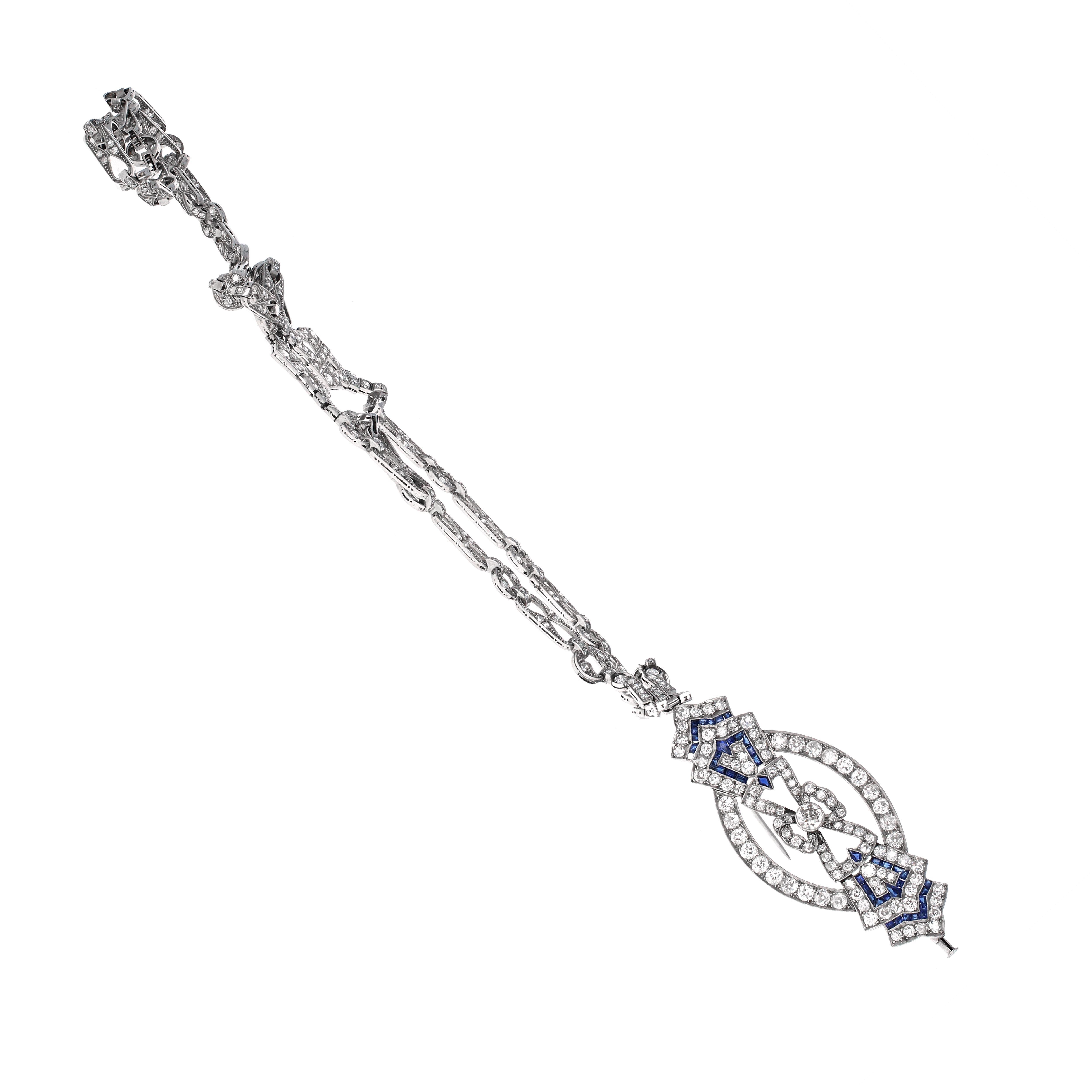 Timeless Art Deco diamond and sapphire sautoir necklace. A sautoir is a French term for a long necklace, chain, ribbon, or scarf  that suspends a tassel or other ornament. The necklace is made in platinum and is in mint condition. This piece can be