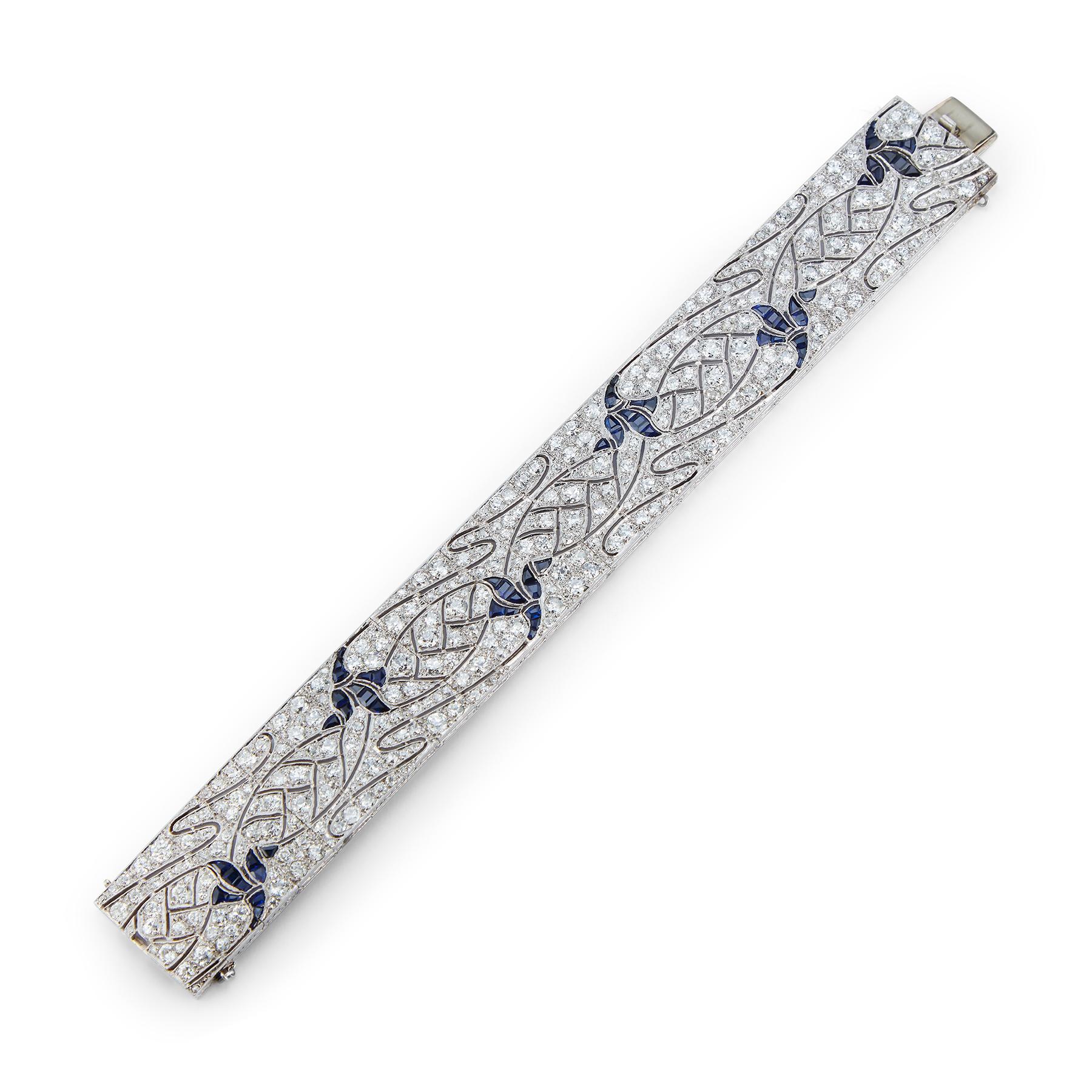 Art Deco Diamond and Synthetic Sapphire Bracelet

Set in platinum. Made circa 1920

Round cut diamond weight: Approximately  15.35 Cts 

Old mine diamond weight: Approximately  2.00 cts

Measurements:  7.25