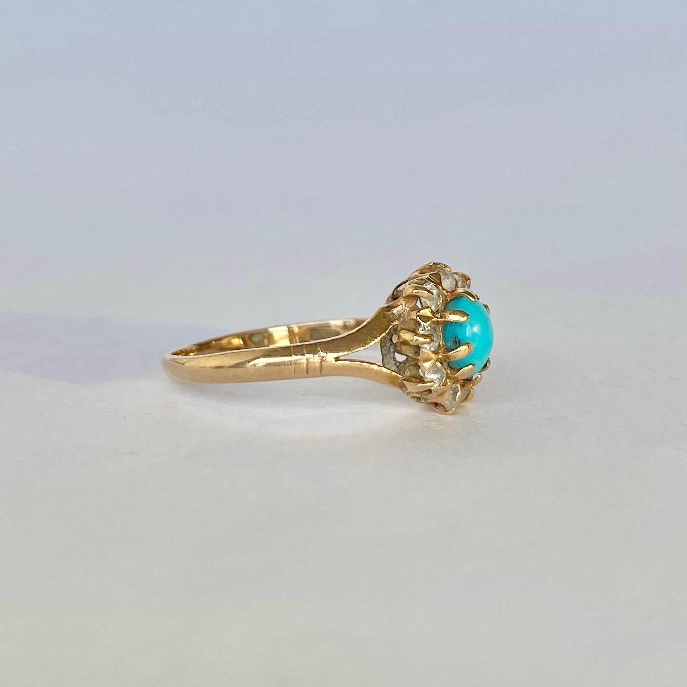 This sweet turquoise and diamond cluster ring holds a total of 20pts of diamond. The ring is modelled in 15carat gold and has split shoulder detail. 

Ring Size: M 1/2 or 6 1/2
Cluster Dimensions: 9x8mm

Weight: 1.8g