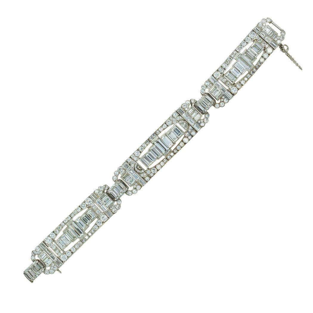 Art Deco diamond and platinum bracelet circa 1930.  *

ABOUT THIS ITEM:  #B-DJ330. Scroll down for detailed specifications.  Very large diamonds capture your interest right away.  A wide bracelet comprising three rectangular panels connected with