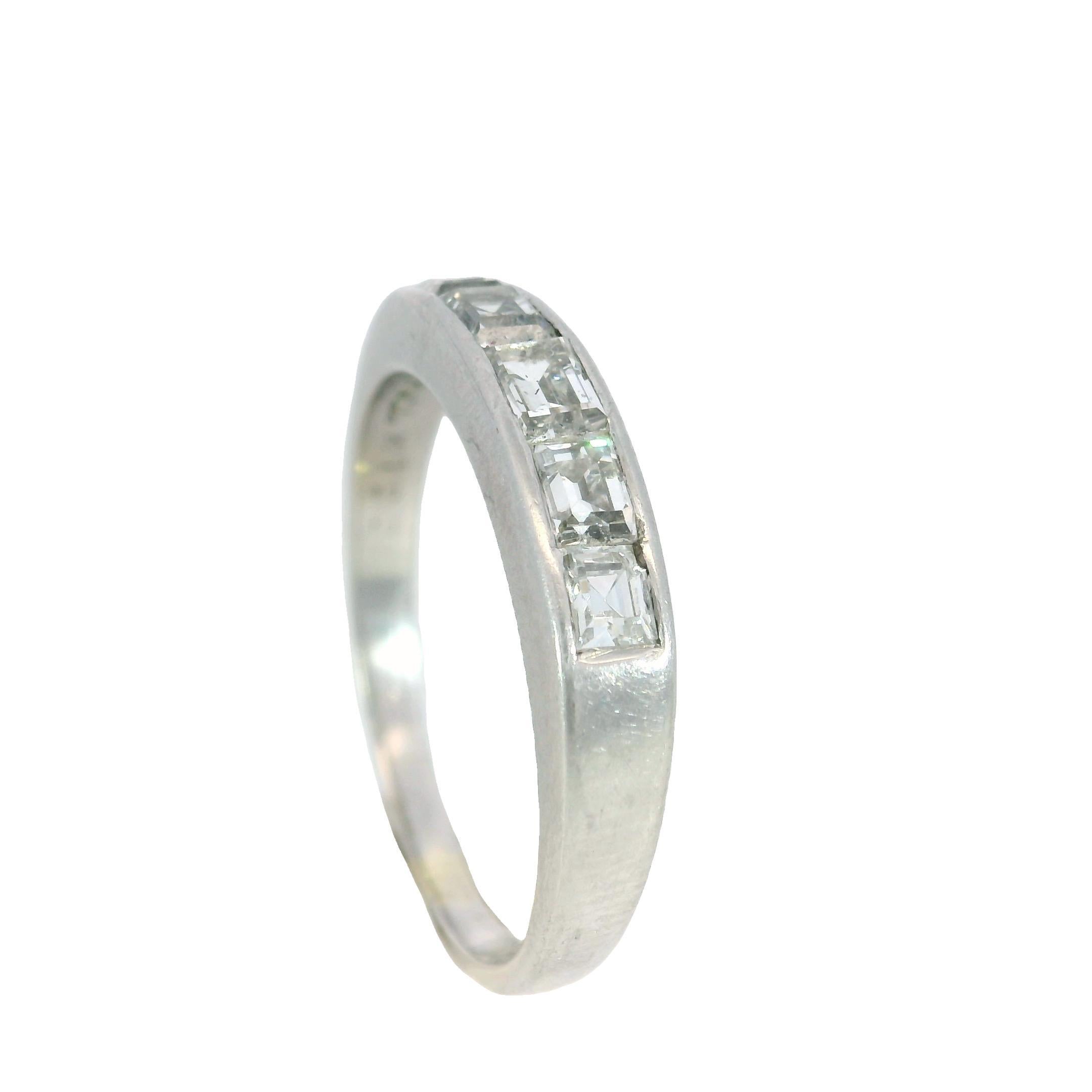 Art Deco Diamond Band Half Eternity Stacker Palladium ~1.22ctw

This refined ring features 1.22 carats of baguette-cut white diamonds, precisely arranged in a clean linear formation. Set in cool-toned palladium, the design emphasizes symmetry and