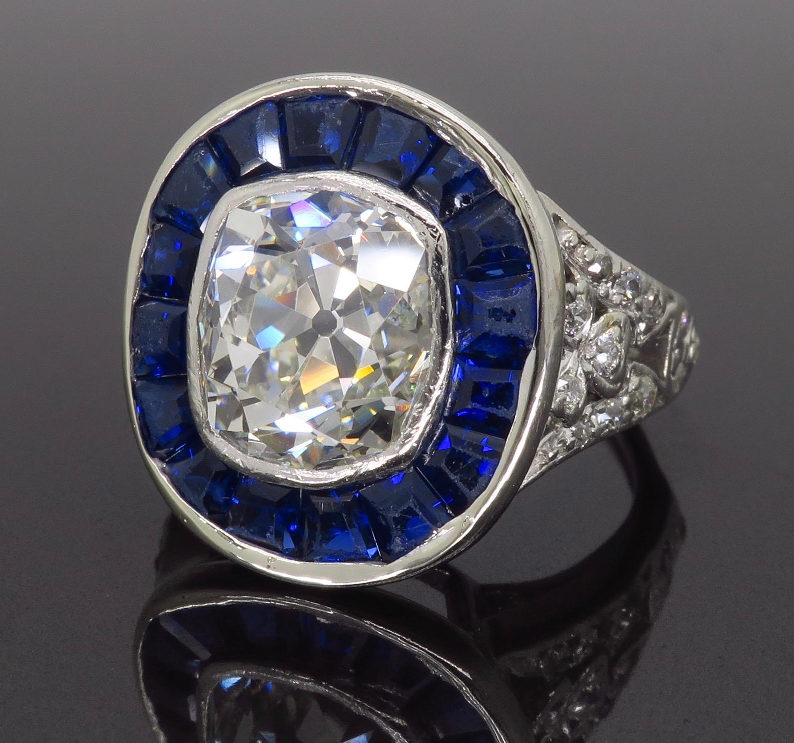 sapphire ring surrounded by diamonds