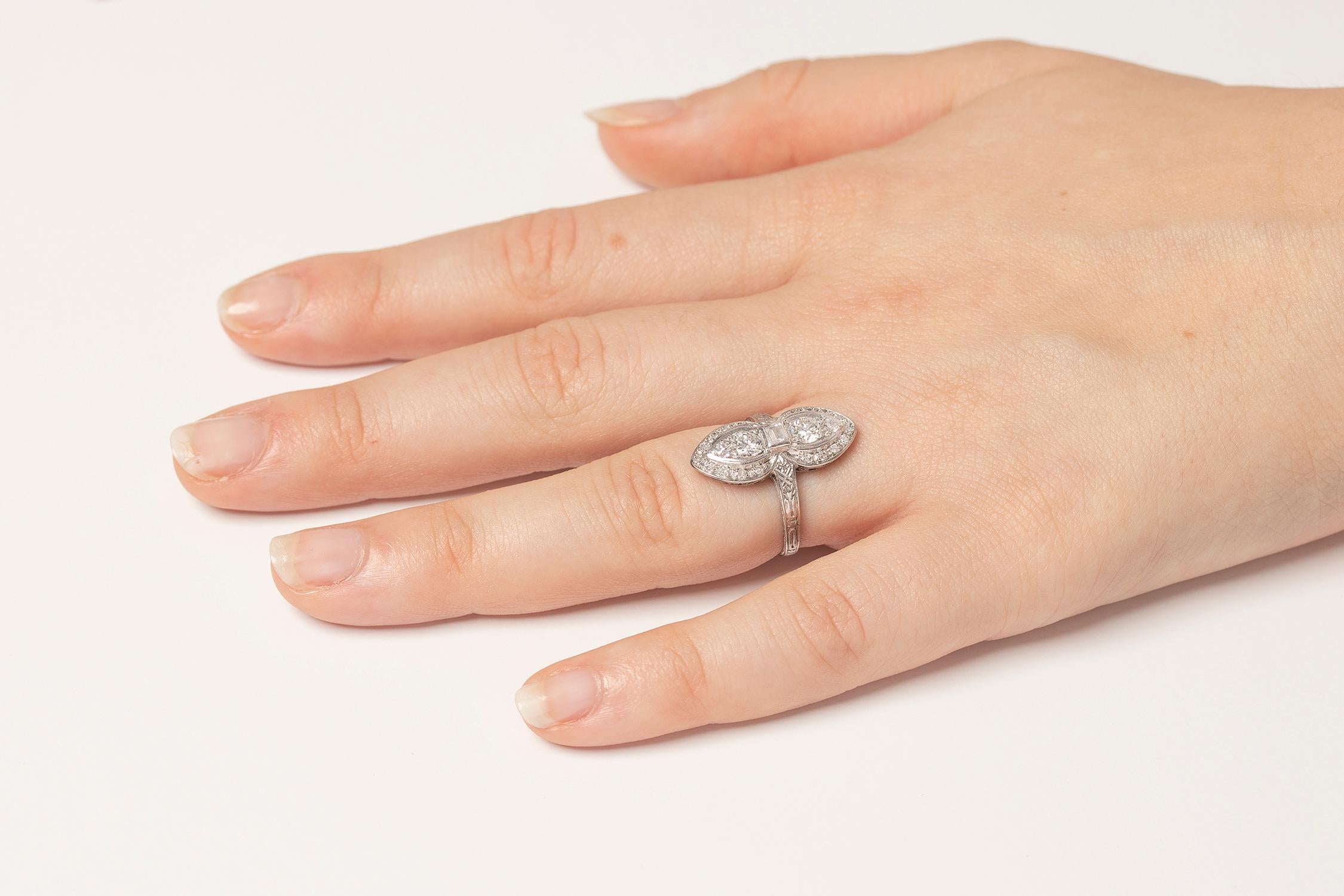 Women's or Men's Art Deco Diamond Bowtie Pattern Ring For Sale