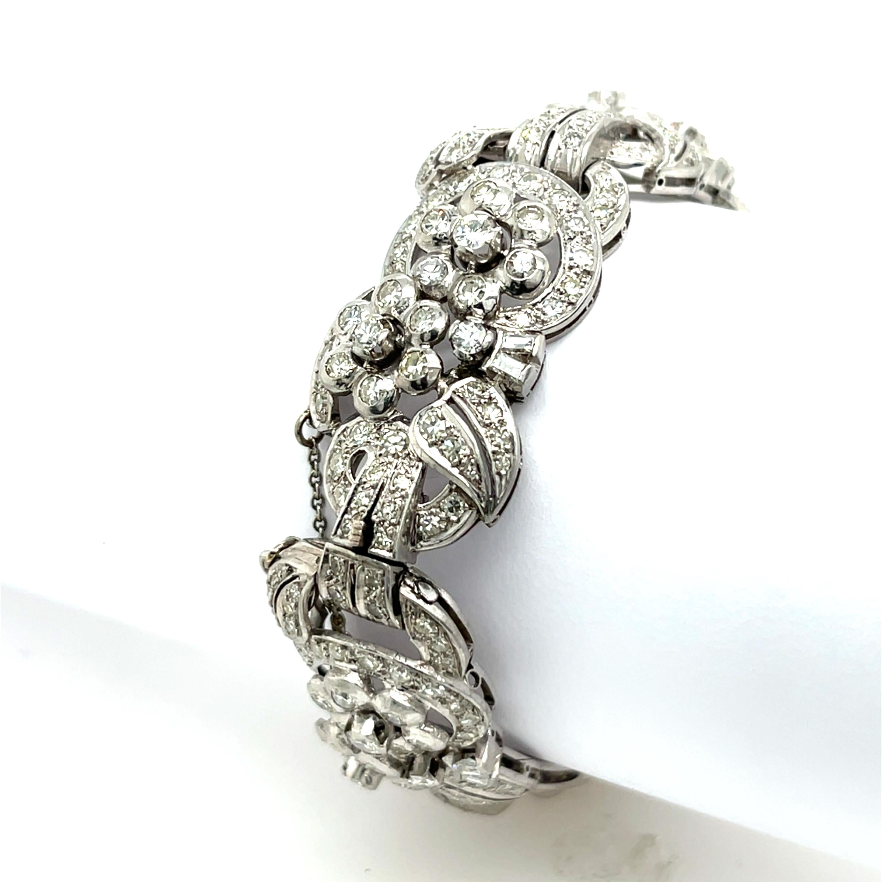 This exquisite Art Deco bracelet features an impressive 8.10ct of mixed round and baguette diamonds, set in luxurious platinum. 

The intricate design showcases the elegance and glamour of the Art Deco era, making this bracelet a breathtaking