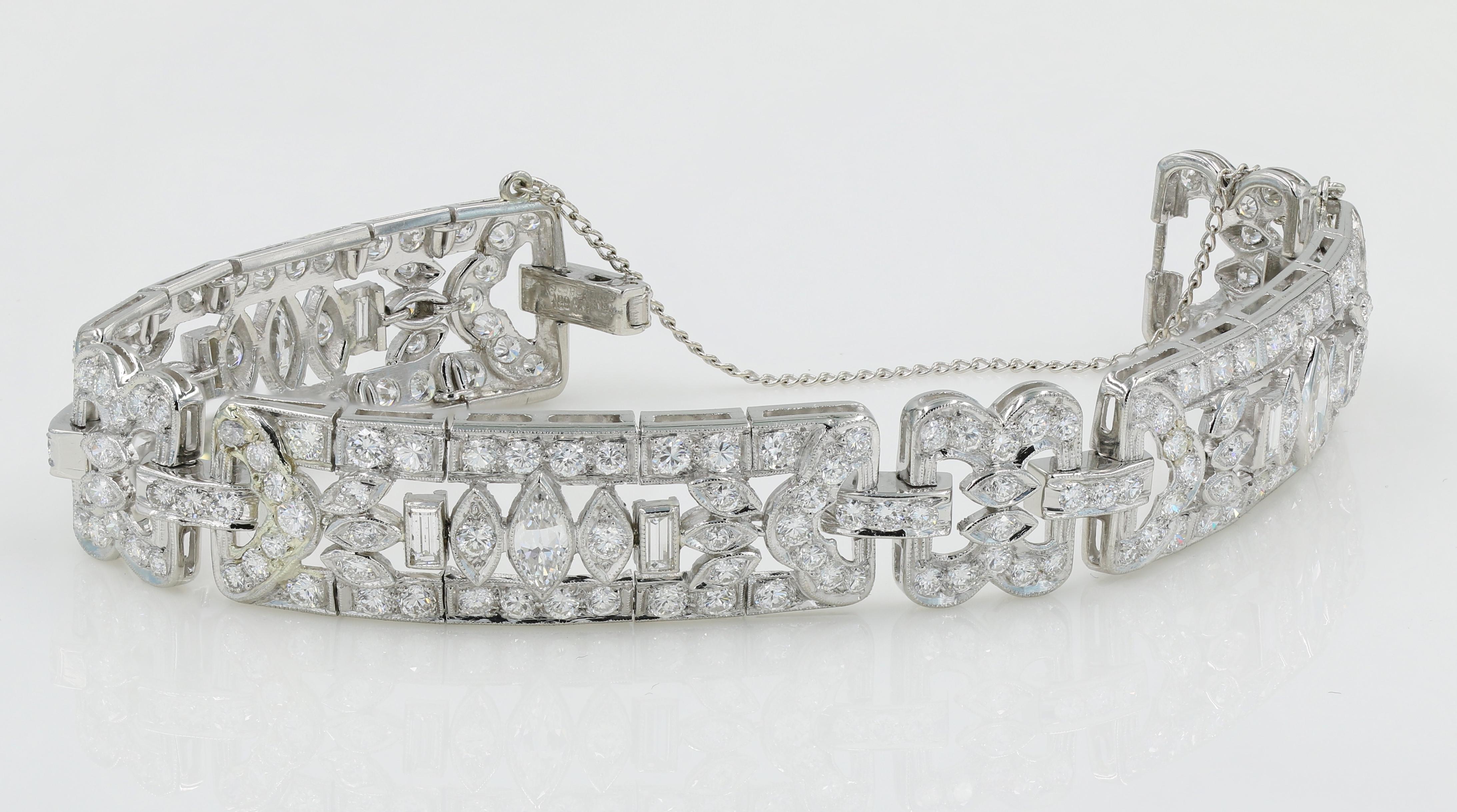 Art Deco Diamond Bracelet in Platinum - Featuring 3 MQ cut Diamonds about 1.00ctw, 6 Baguette cut Diamonds about 0.90ctw, & 180 Round cut Diamonds about 6.72ctw. Bracelet is hand made, circa 1920 - 1930's. Diamonds are G-H color, VS clarity. It