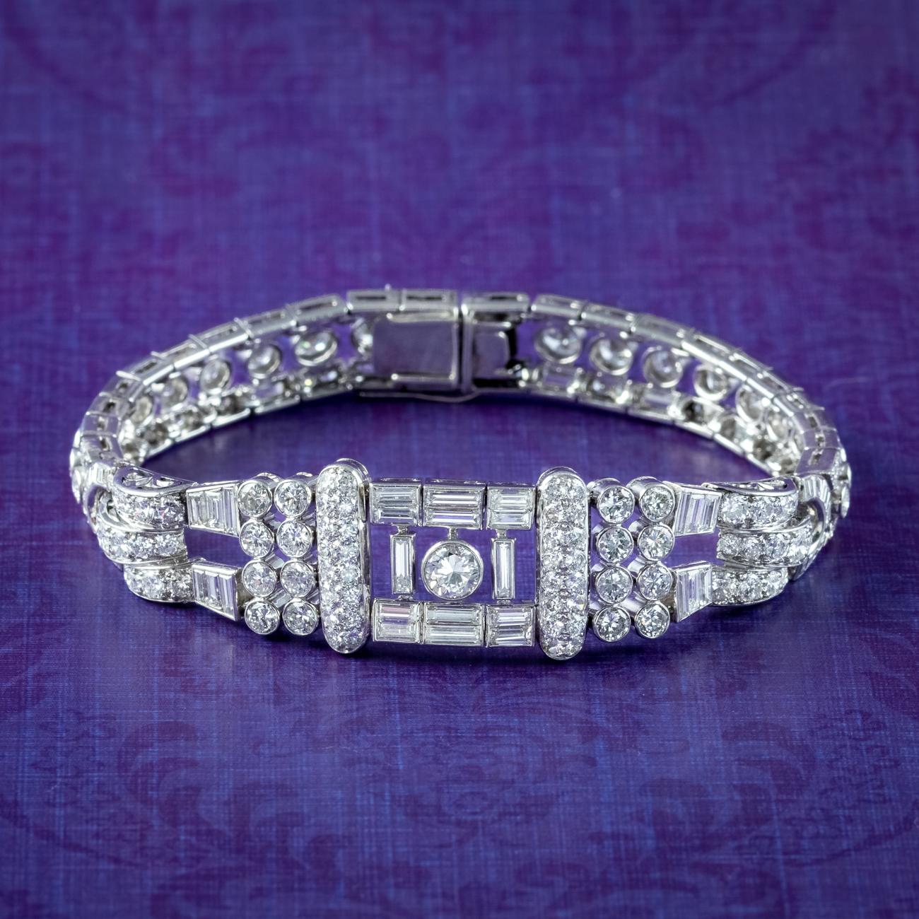 A magnificent Art Deco diamond bracelet from the 1920s decorated with a dazzling array of bright, clean diamonds in both brilliant and baguette cut. They have excellent VS1 clarity – H colour with the largest weighing 0.50ct in the centre, bringing