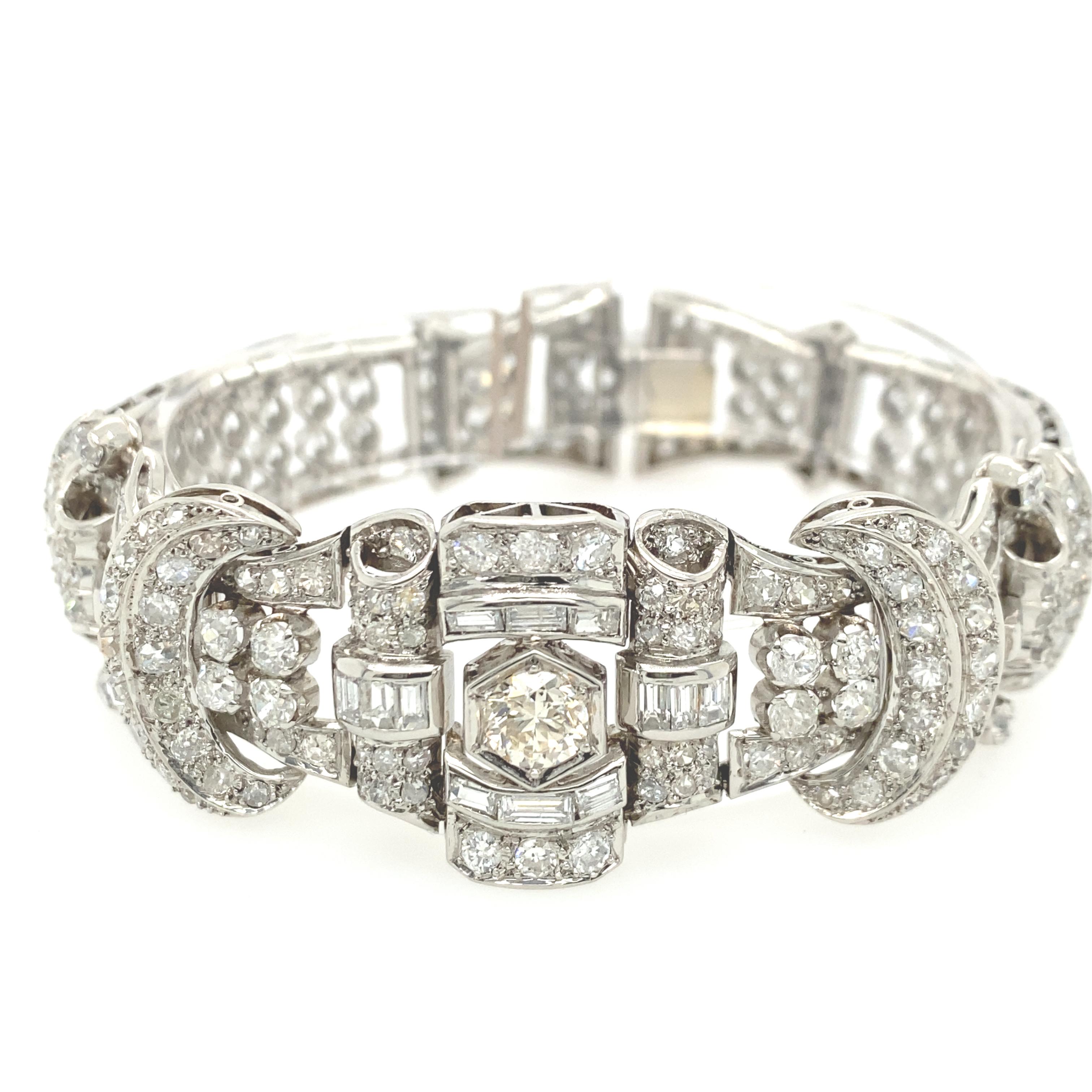 Fabulous 1940’s Art Deco Diamond Bracelet. The center diamond is approximately 1.00carats and had H-I color and VS Clarity. Total carat weight approximately 12.50carats
All the diamonds have G-H-I color and VS-SI clarity. The mounting is handmade in