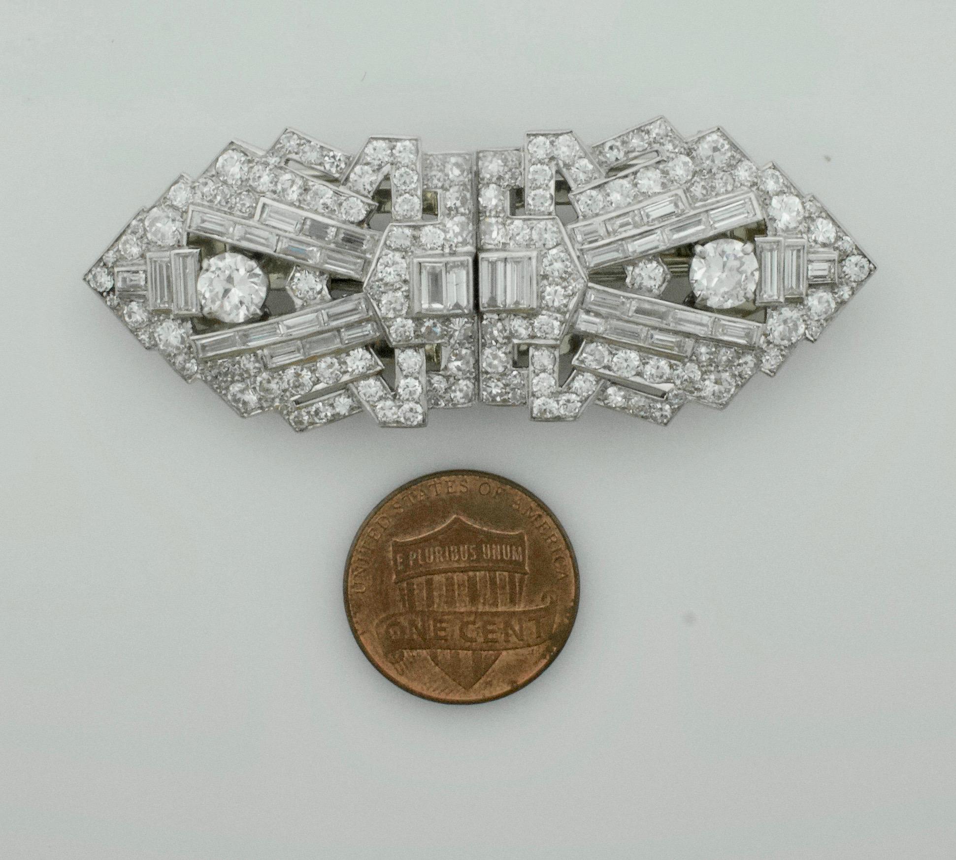Art Deco Diamond  Brooch Clips Circa 1920's 7.70 carats
Two  Old European Cut Diamonds Weighing 1.20 Carats Approximately  [GH SI2]  [bright with no imperfections visible to the naked eye]
Thirty Four Baguette Cut Diamonds Weighing 2.00 Carats