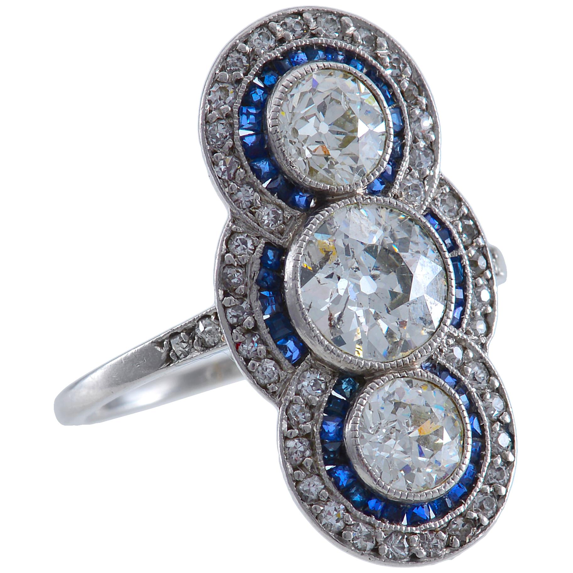 Art Deco Diamond Calibre Cut Sapphire and Platinum Ring For Sale