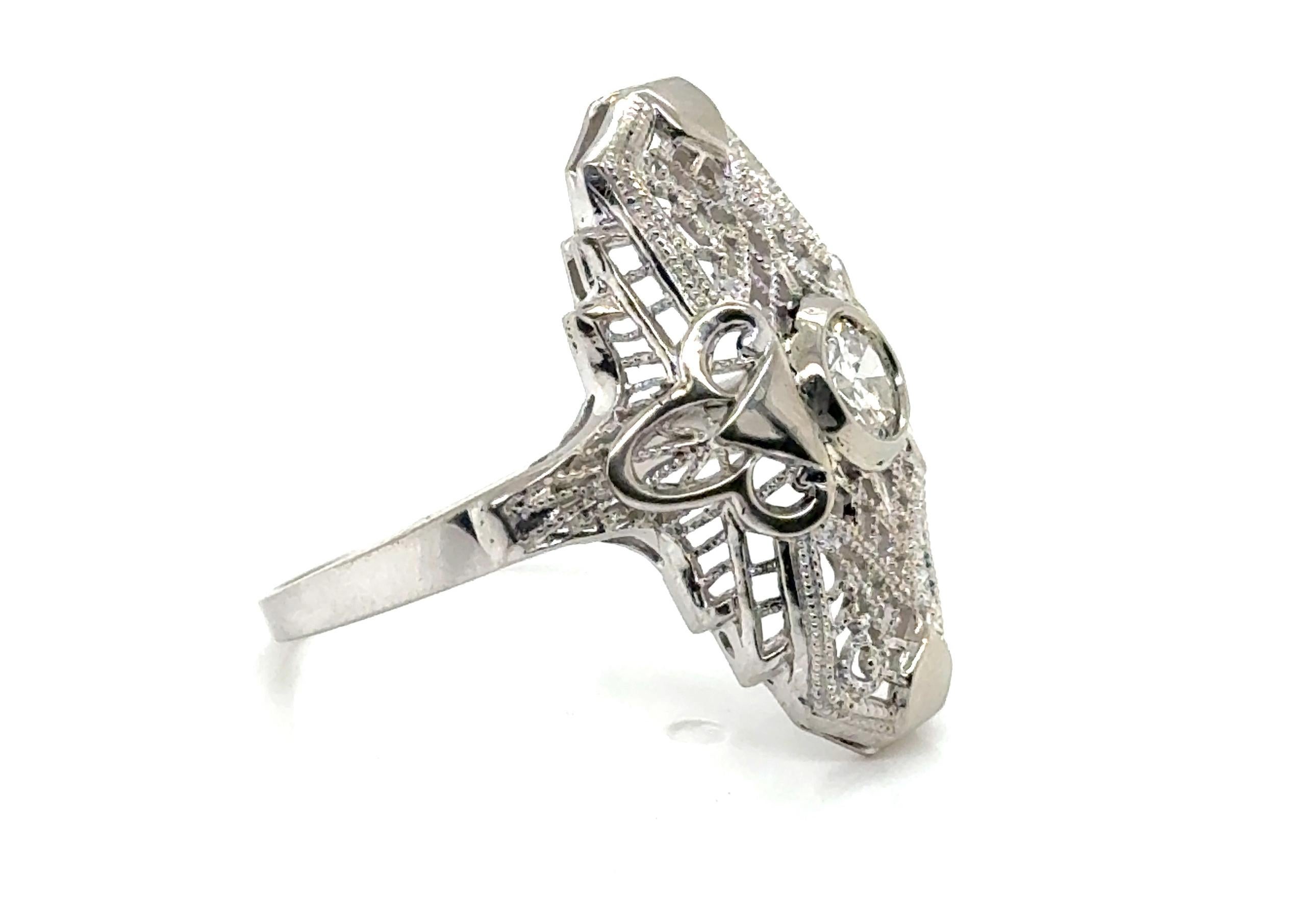 Genuine Original Antique from 1920s Diamond Filigree Cocktail Ring .31ct Antique Art Deco 14k


Centering on a Natural Mined .31 Carat Old European Cut Diamond Center

Accentuated with Fine Milgrain and Decorative Filigree Piercing  

Absolutely
