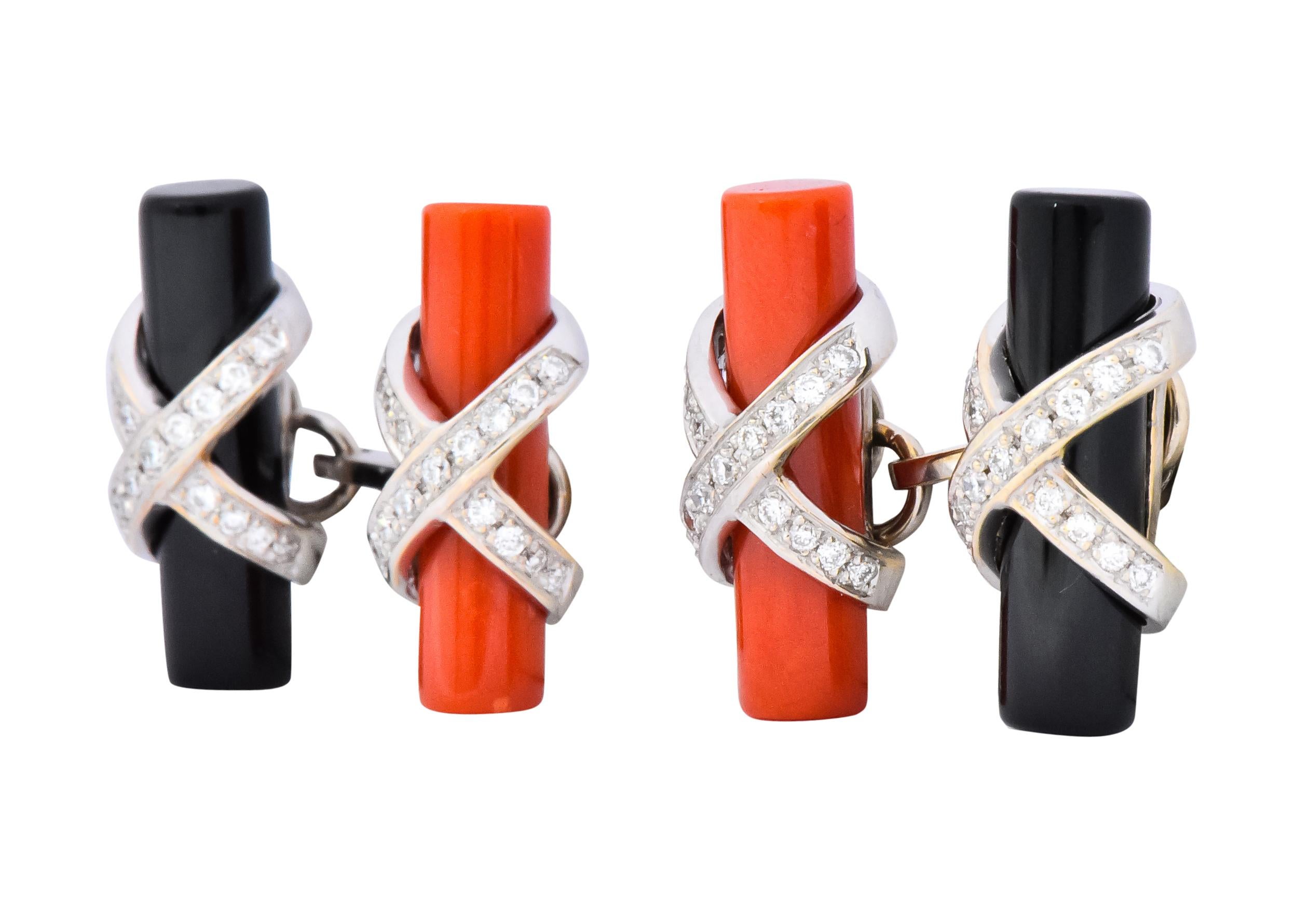 Each with one polished onyx and coral cylinder

Wrapped in an 