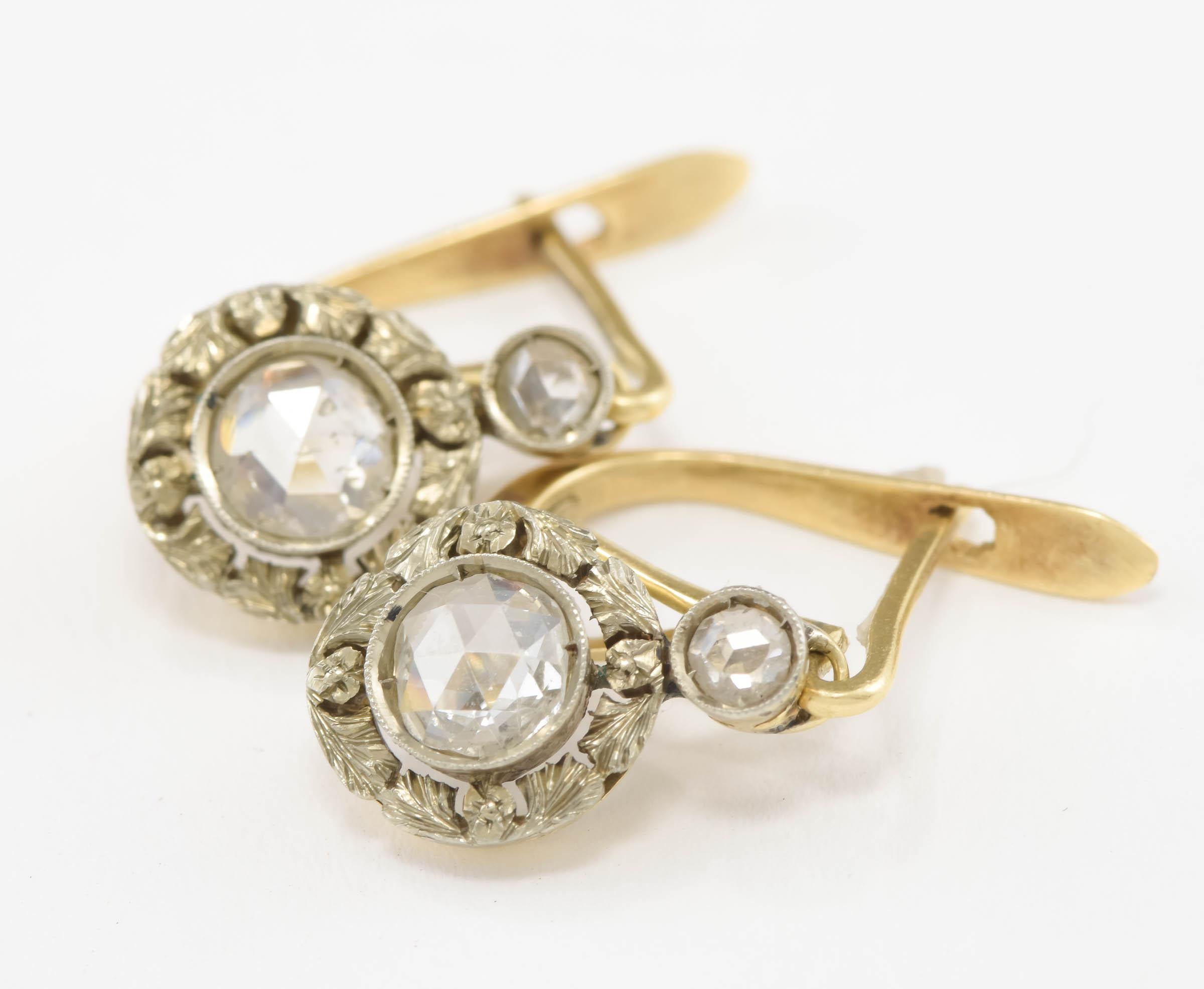 Dainty and charming, this lovely pair of sparkly rose cut diamond earrings dates to the 1930's late Art Deco period.  The pretty diamond drops may be removed from the 14K yellow gold ear wires, allowing one to add other dangle style drops, if