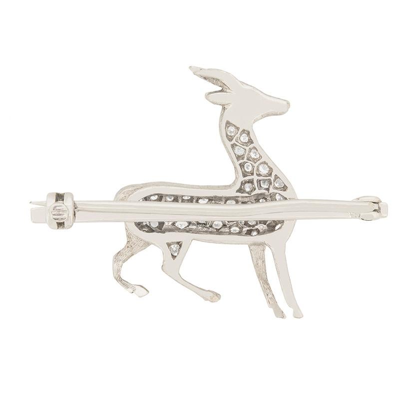 This beautiful little brooch is a lovely piece of vintage jewellery, perfect for an elegant wearer. It is covered with grain set diamonds, which truly make it stand out. They are a mix of transitional cuts and eight cuts, which have a total weight