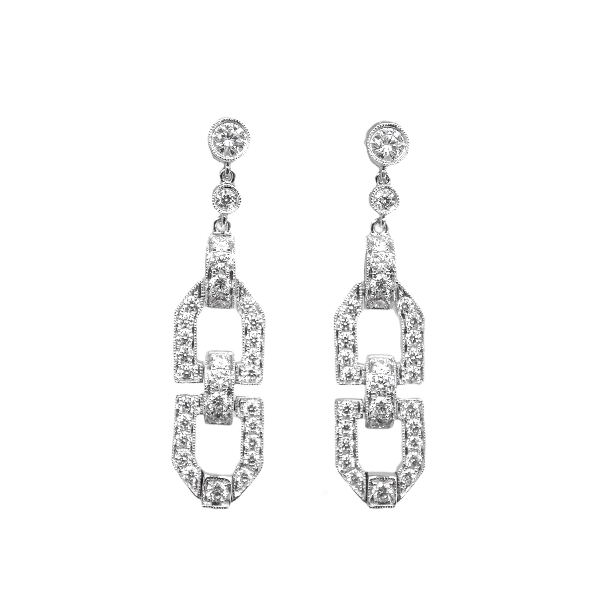 Stunning art deco style diamond earrings, the perfect statement earrings with beautiful filigree detailing on the edges. 

The earrings feature approximately 1.60ct of natural diamonds and can be crafted in 18k white, rose or yellow gold. 

The drop