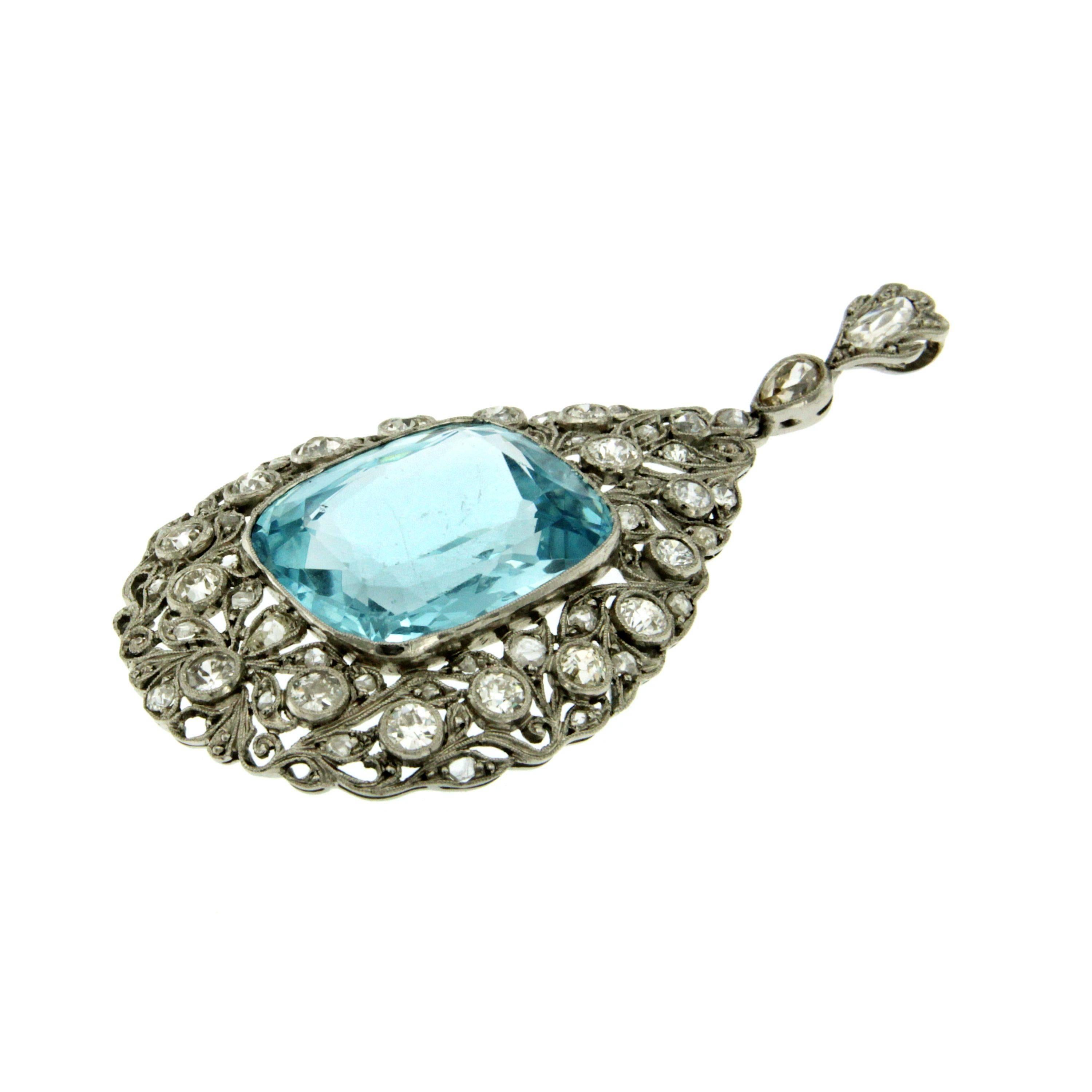 This pendant is set with a central synthetic stone accentuated by 3.50ct. of round brilliant cut diamonds G/H color Vvs.
Hand crafted in 18k Gold. Circa 1930

CONDITION: Pre-owned - Excellent
GEM STONES: Synthetic stone, Diamonds 3.50 total