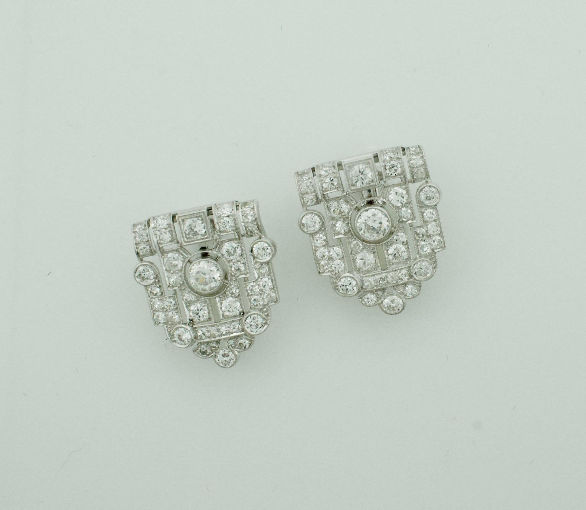 Art Deco Diamond Earrings in Platinum Circa  1930's
Two Old European Cut Diamonds Weighing 1.20  Carats Approximately 
Twelve Old European Cut Diamonds Weighing 1.95  Carats Approximately  
Sixty Two  Round Cut Diamonds Weighing 3.35 Carats