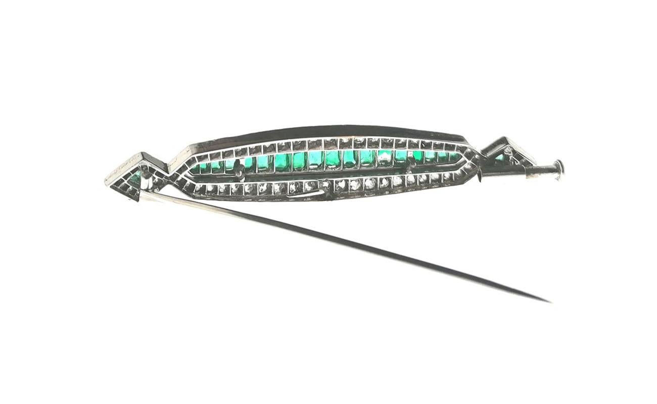 Art Deco Bar Platinum brooch with emeralds ( 3.00 carats estimated ) and old-cut diamonds ( 4.50 carats and H - VS2 approximately ). English origin looking at the style.