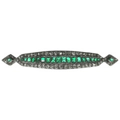 Art Deco Diamond, Emerald and Platinum Bar Brooch