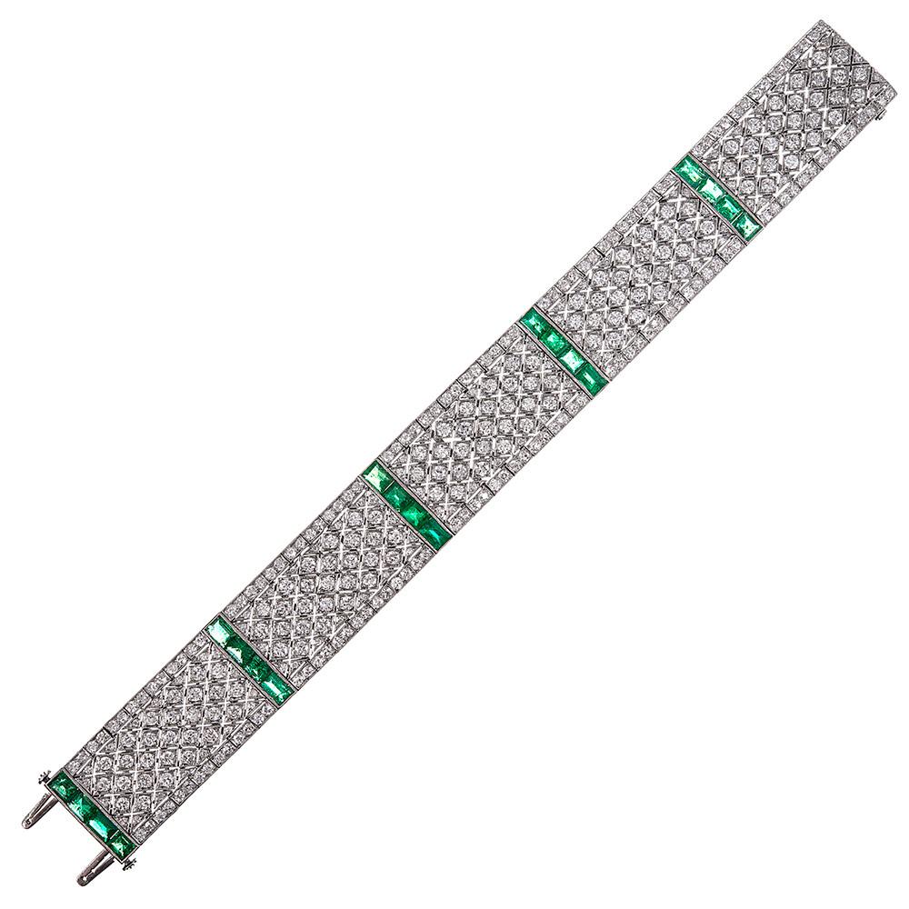 An exceptional original art deco creation, compliments of esteemed jeweler Oscar Heyman, this platinum bracelet measures just over 7.25 inches long and .75 inches wide. The piece is of sophisticated manufacture, with a lovely hand and is set with