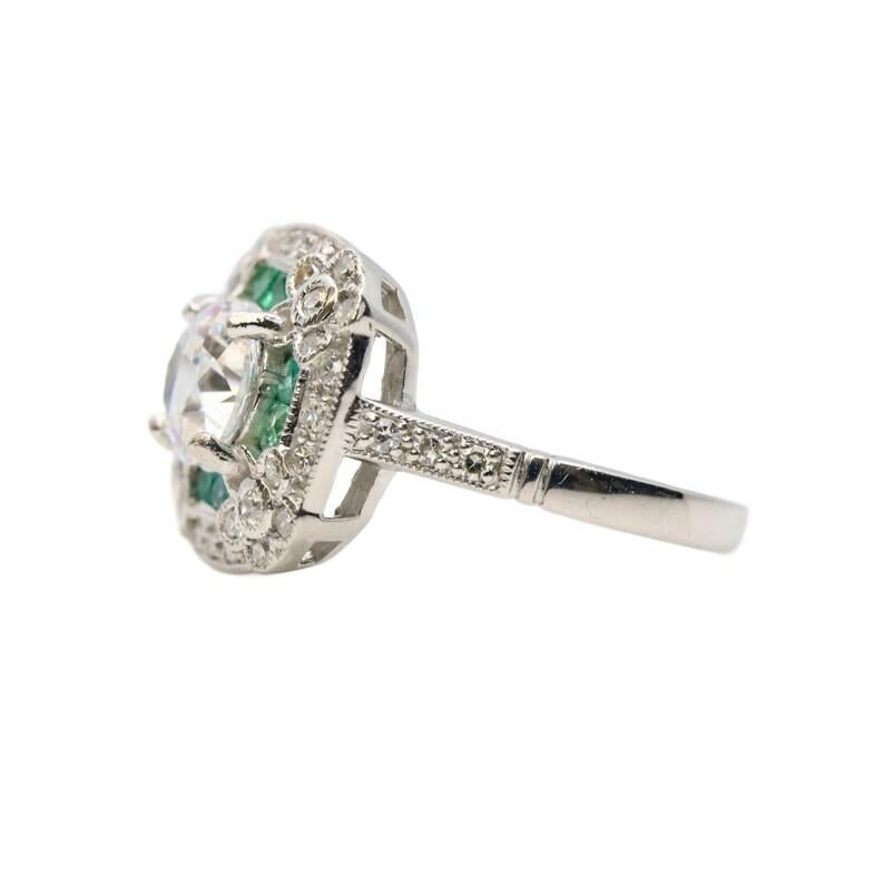 Old European Cut Art Deco Diamond & Emerald Floral Motif Engagement Ring in Platinum For Sale
