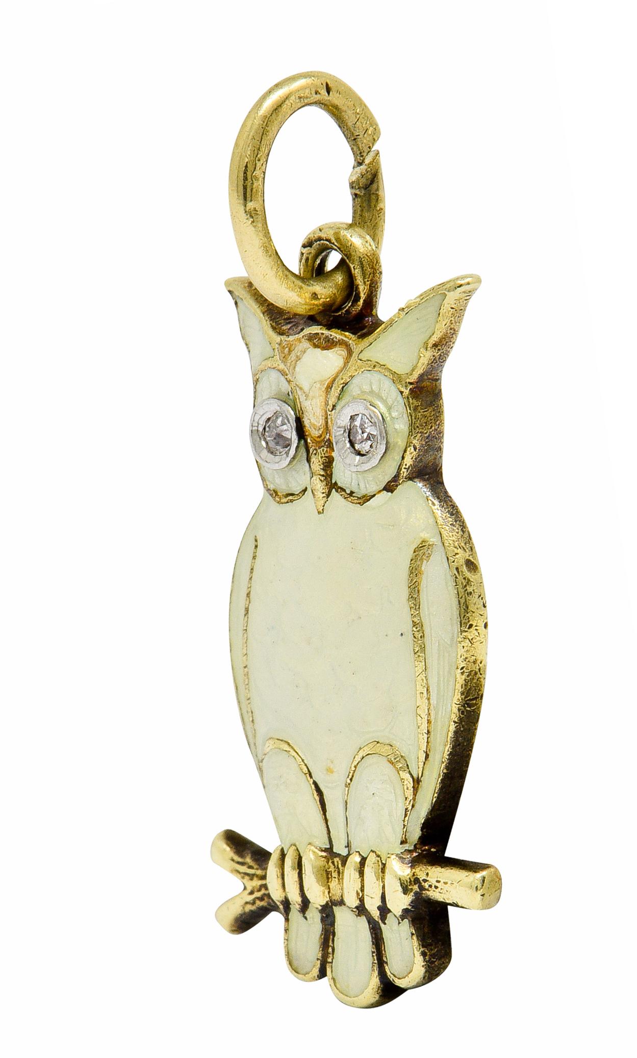 Designed as an owl perched on a branch with diamond eye accents

Body is glossed on both sides with a pearlescent white enamel exhibiting no loss

Back of owl features in gold lettering 'La Nuit Porte Conseil' French to mean 