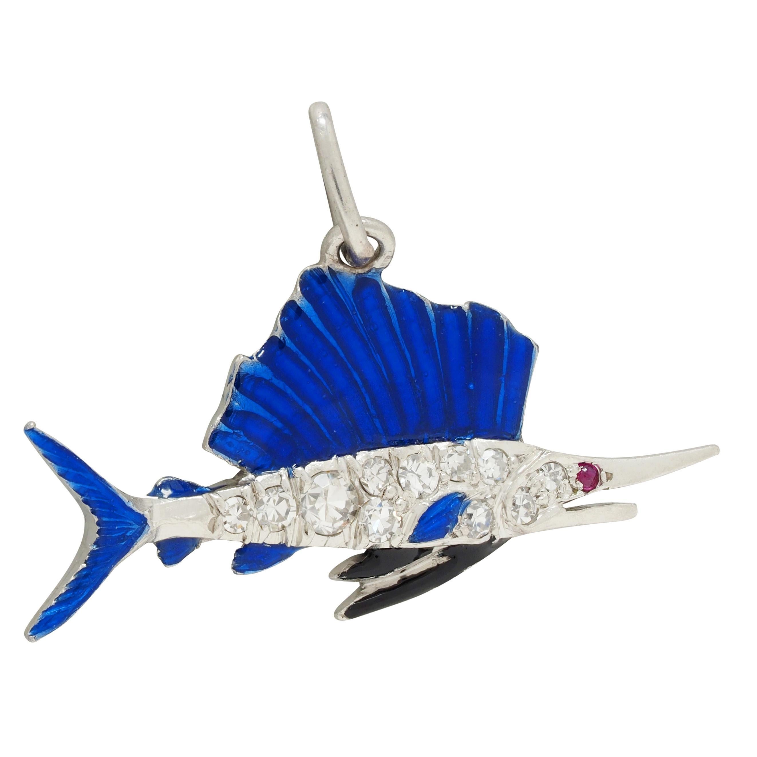 Designed as a swordfish with pavé set single cut diamonds throughout 
Weighing approximately 0.10 carat total - eye clean and bright
Featuring enameled fins - transparent blue and black 
Glossed over linear engraving on back fin - exhibiting minimal