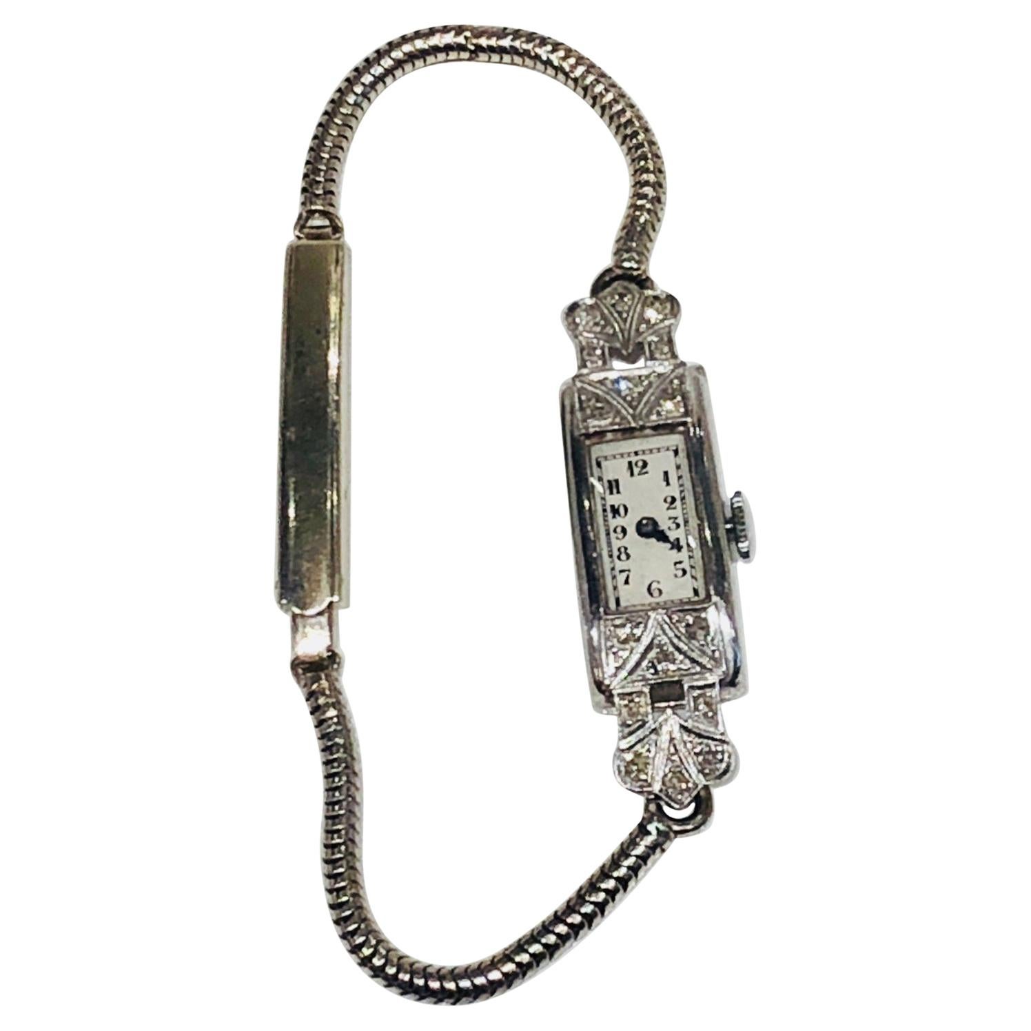 Montre-bracelet cocktail Art déco incrustée de diamants, platine