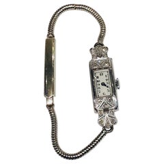 Montre-bracelet cocktail Art déco incrustée de diamants, platine