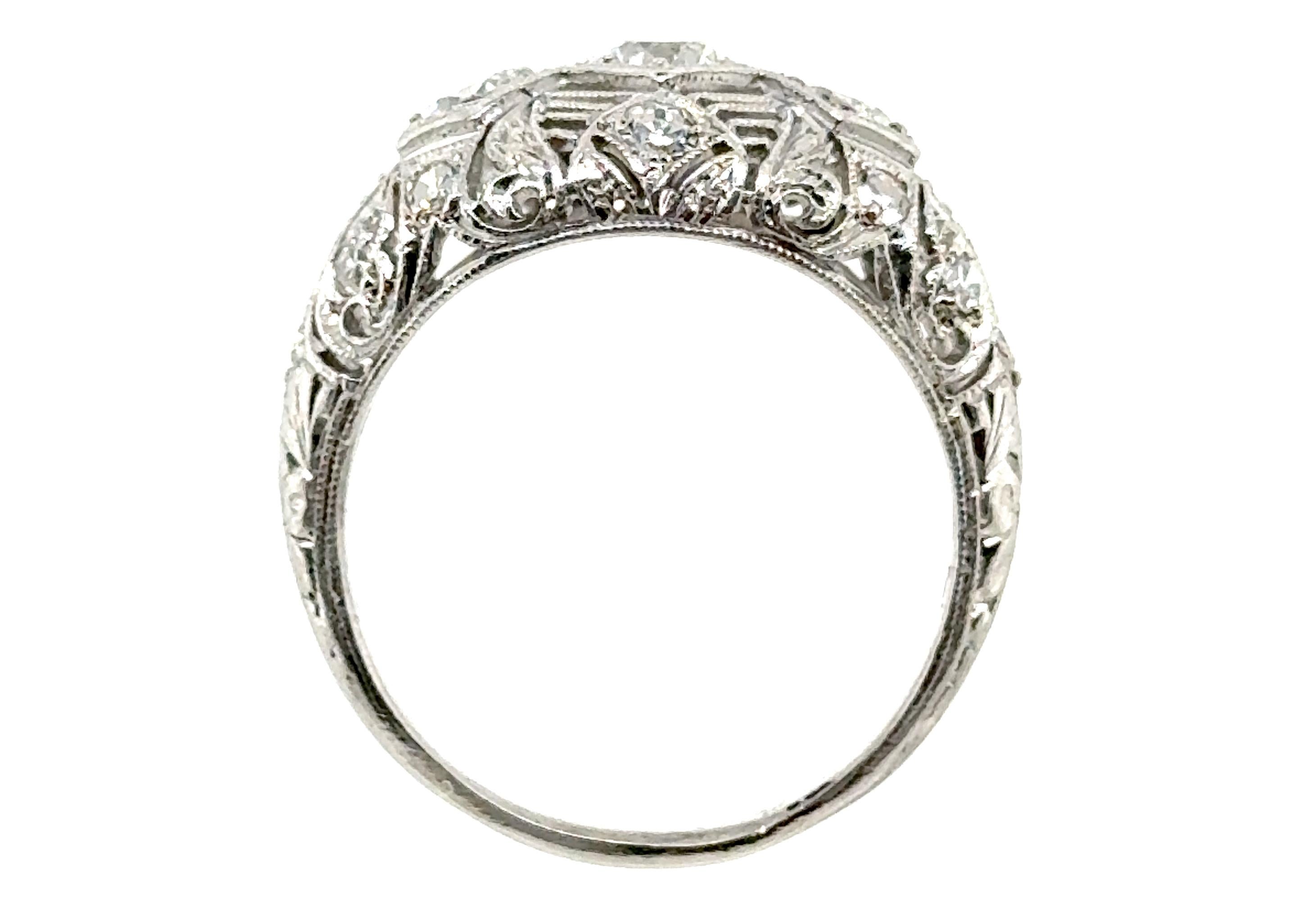Genuine Original Art Deco Antique from 1930's Vintage 1ct Transitional Ring Platinum 


Features a Gorgeous .23ct Transitional Cut Diamond as its Centerpiece 

Center Diamond is Flanked on Either Side by a Matching Colorless Transitional Cut