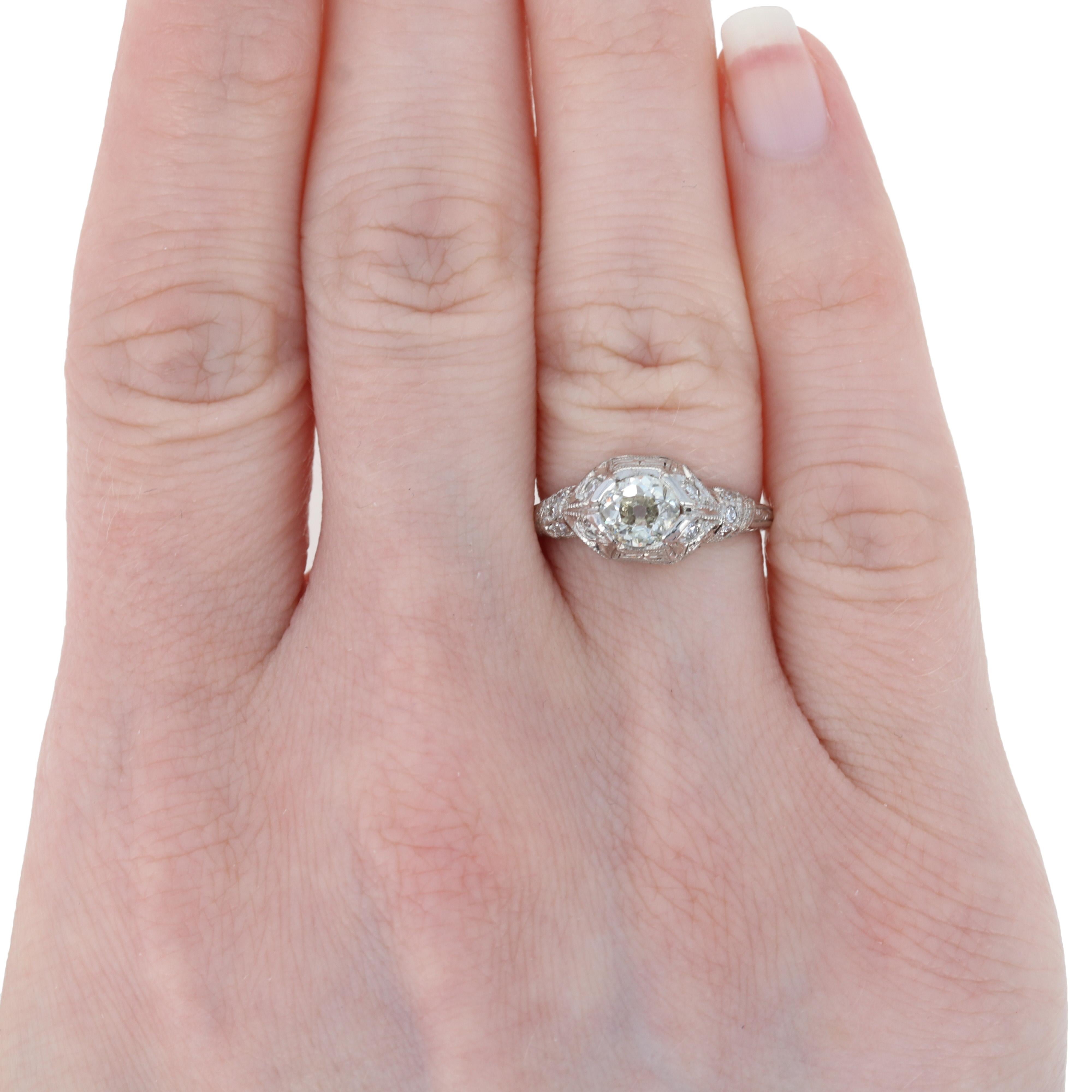 Carry forward the time-honored values of true love and lifetime commitment when you propose with a vintage engagement ring! This exquisite ring is an Art Deco piece dating from the 1920?s - 1930?s, an era that valued innovative design and meticulous