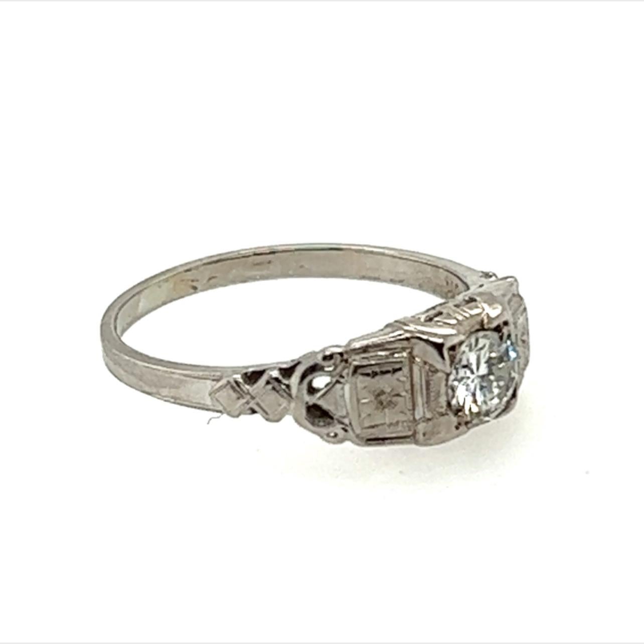 Genuine Original Art Deco Antique from 1940's Solitaire Diamond Engagement Ring .30ct Transitional Cut Antique 18K


Featuring a Beautiful Genuine .30ct F-G/VS Natural Mined Transitional Cut Diamond Center

Hand Engraved Flowers and Design 

Perfect