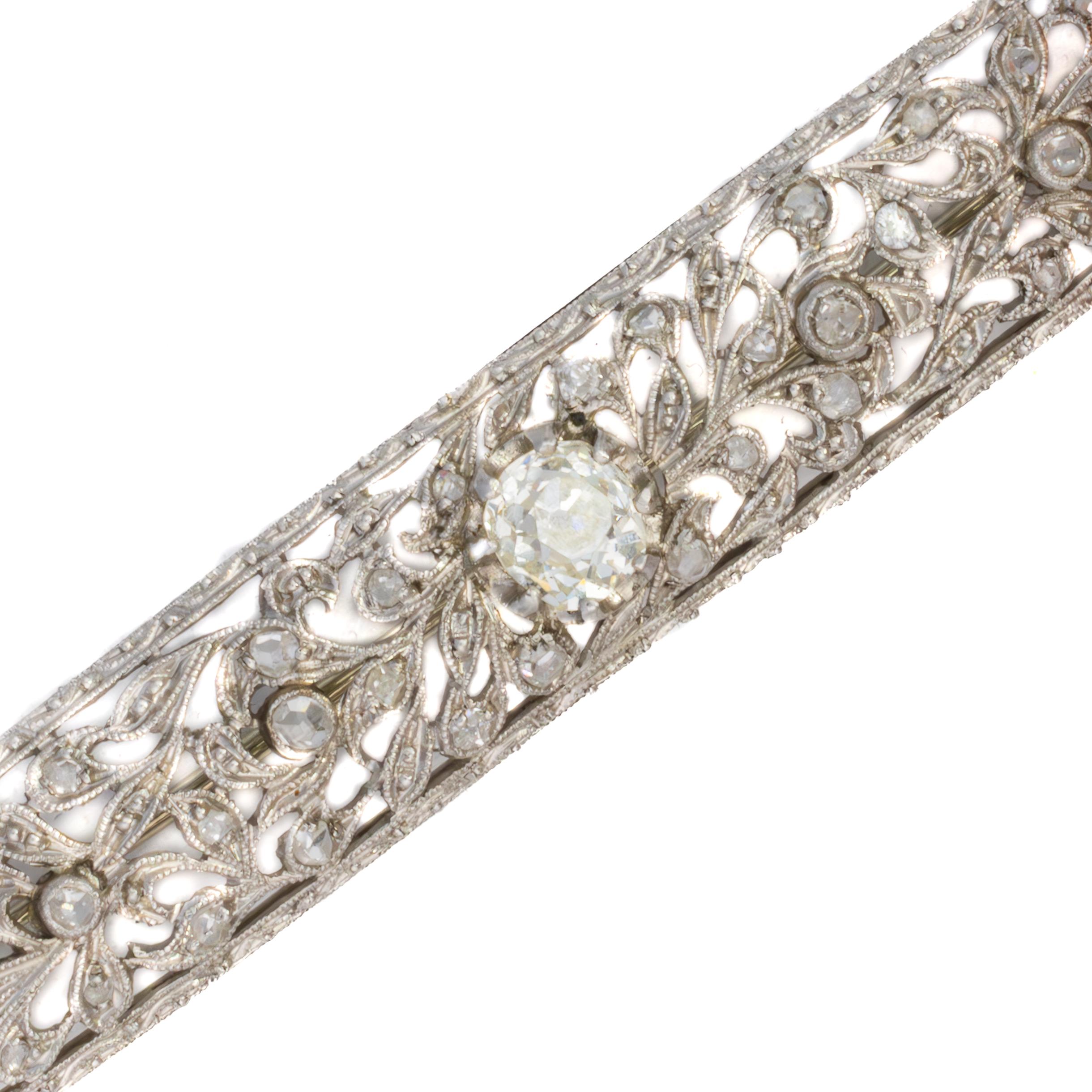 Art Deco Diamond Filigree Bar Brooch


A graceful and finely detailed Edwardian diamond bar brooch, crafted in platinum with a charmingly airy floral motif. At its center rests a lively old European cut diamond, framed by an openwork scroll of vines