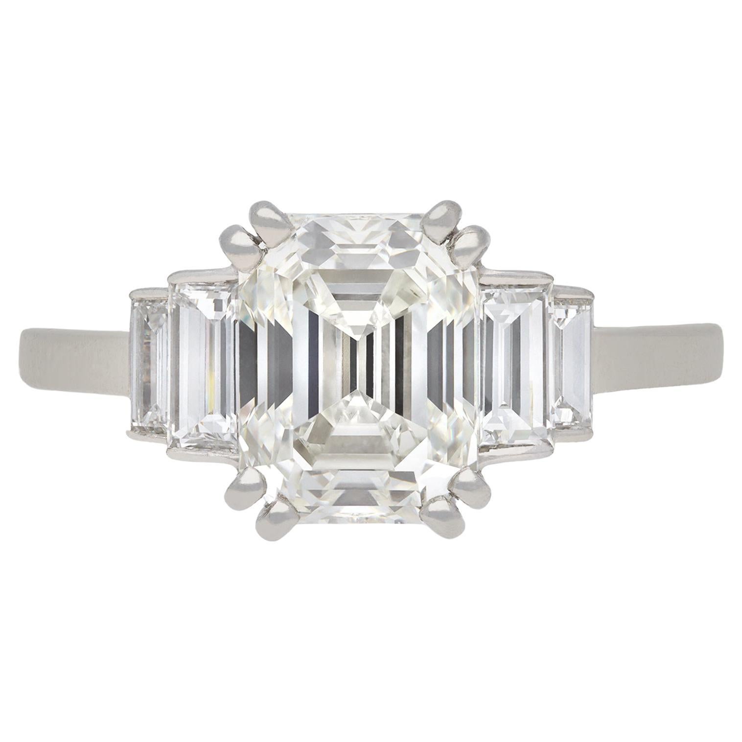 Art Deco diamond flanked solitaire ring, circa 1930. For Sale