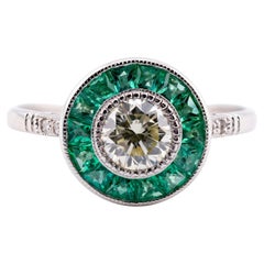 Bague de fiançailles Art déco en platine avec diamant et émeraude de taille française