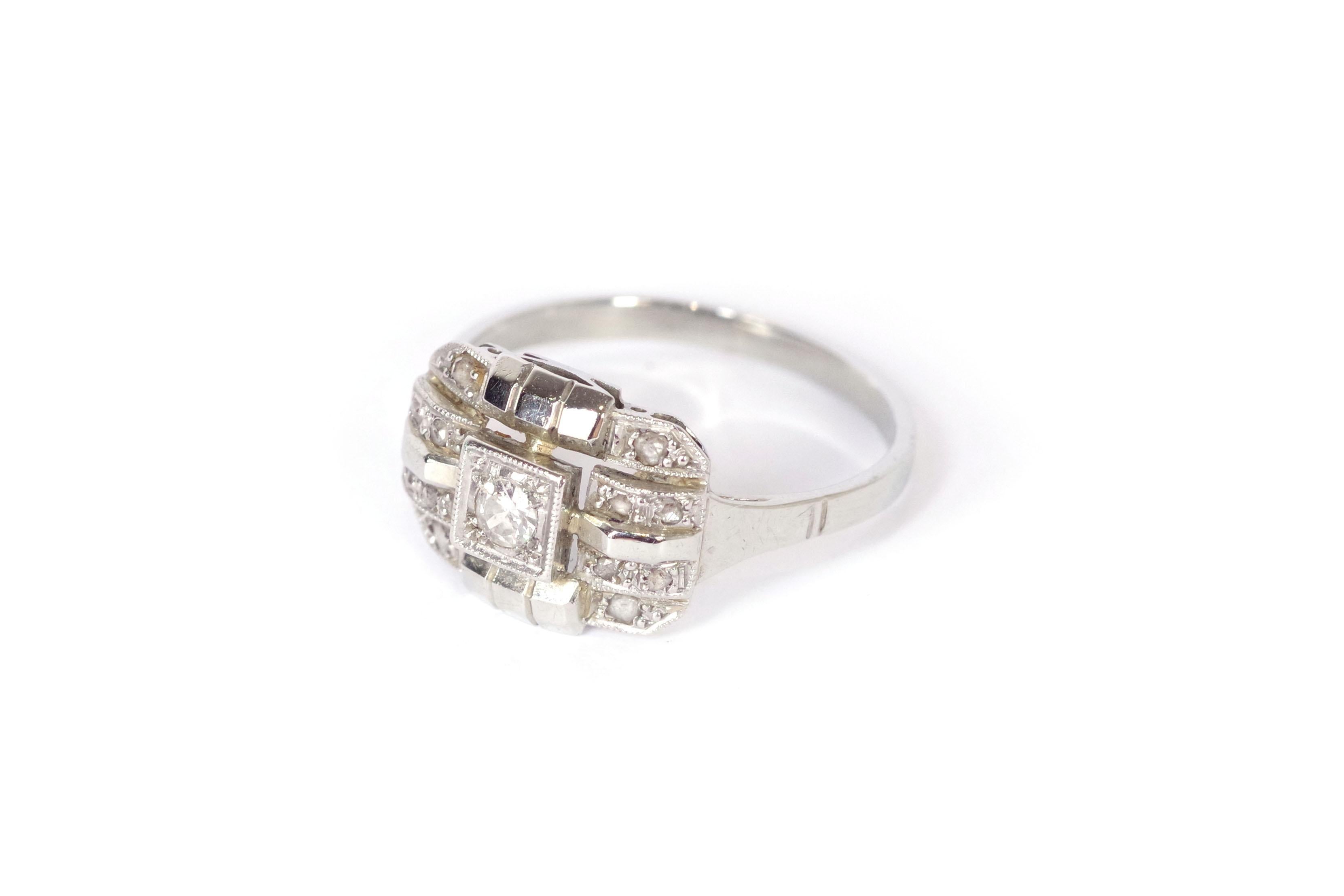 Brilliant Cut Art Deco diamond geometric ring in gold and platinum