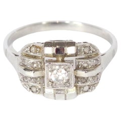 Antique Art Deco diamond geometric ring in gold and platinum
