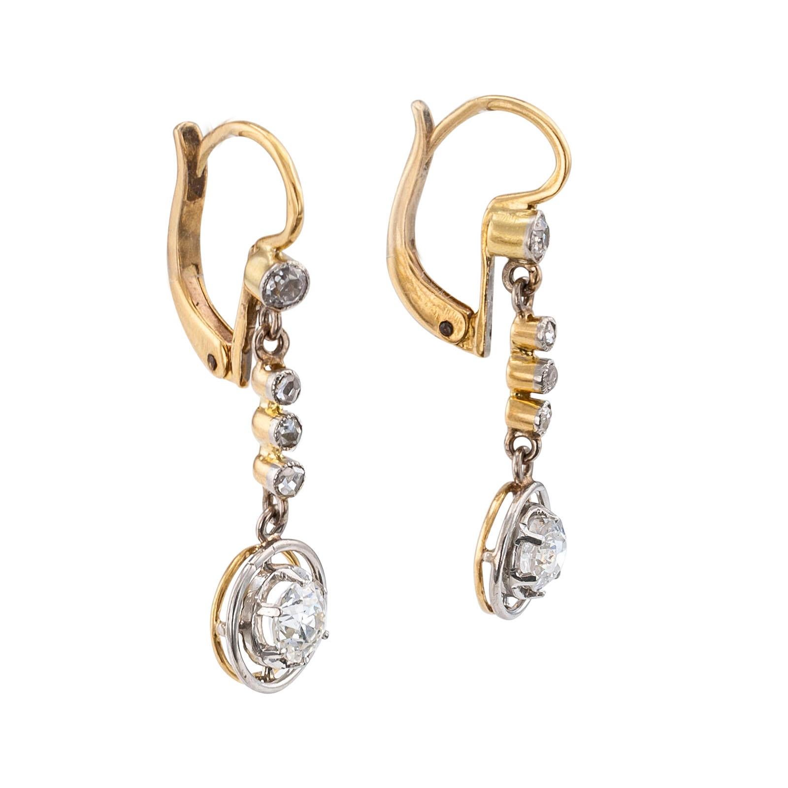 Art Deco diamond drop earrings.
DETAILS:
Art Deco diamond gold and platinum drop earrings circa 1930.
DIAMONDS: two old European-cut diamonds together weighing approximately 0.60 carat, approximately H – J color and VS – SI clarity, two smaller old