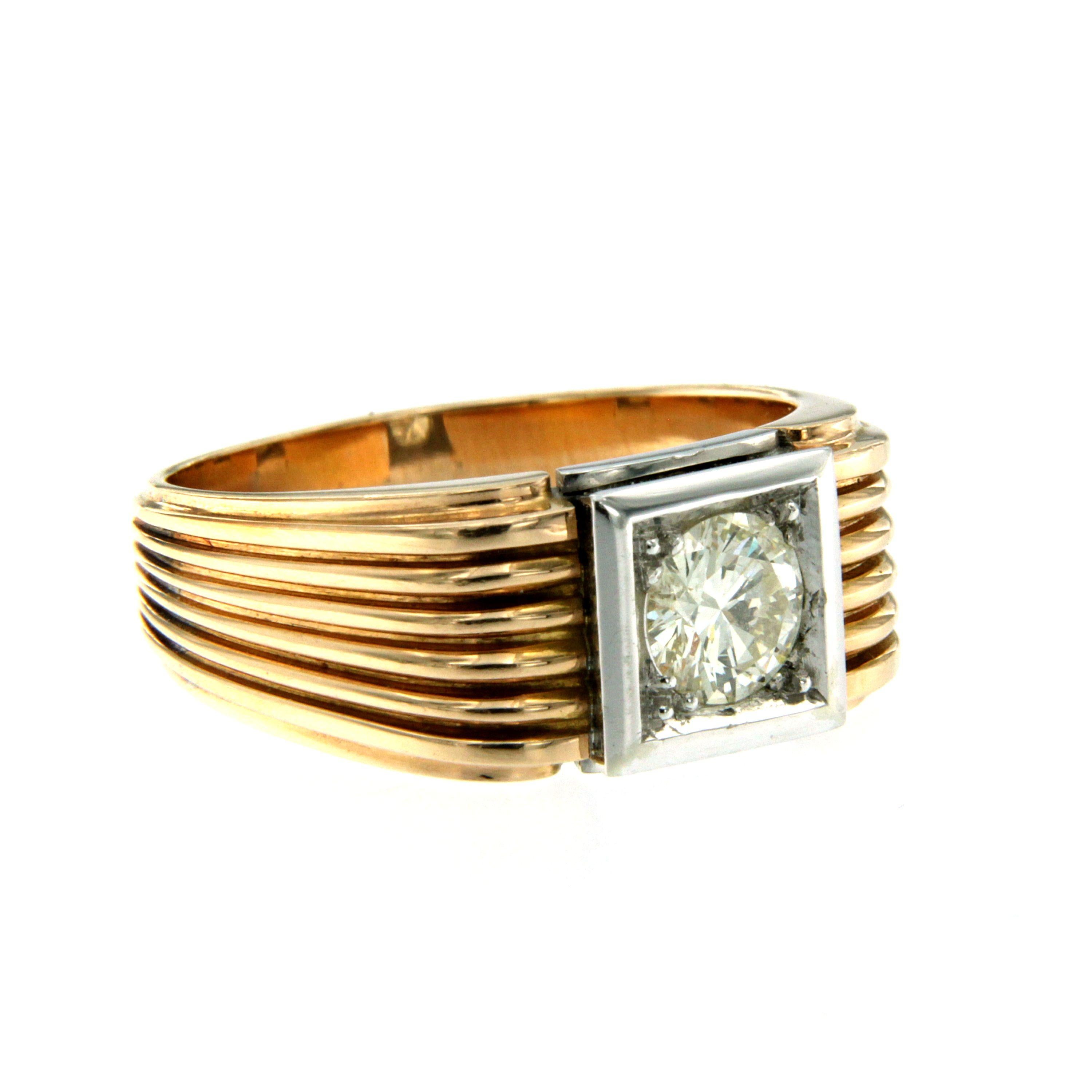 Unique unisex Art Deco setting featuring a very beautiful and different wave design. This ring is hand-crafted in 18k white and rose gold, authentic from 1930, featuring in the center a sparkling Old European brilliant cut Diamond weighing approx.