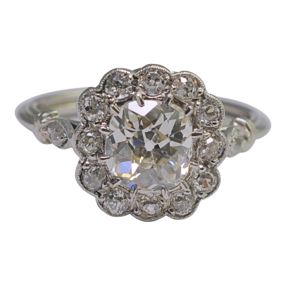 Art Deco Diamond Halo Platinum Engagement Ring In Excellent Condition For Sale In ALTRINCHAM, GB