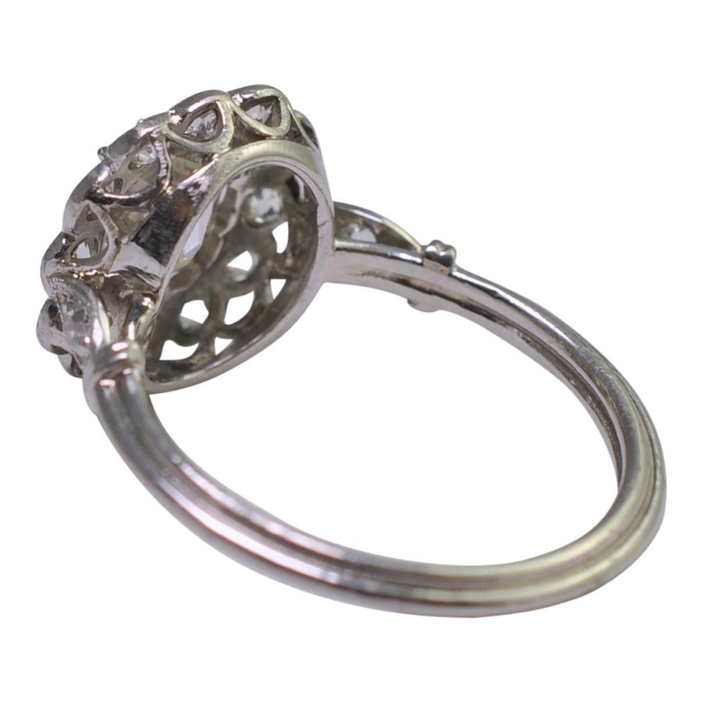 Women's Art Deco Diamond Halo Platinum Engagement Ring For Sale