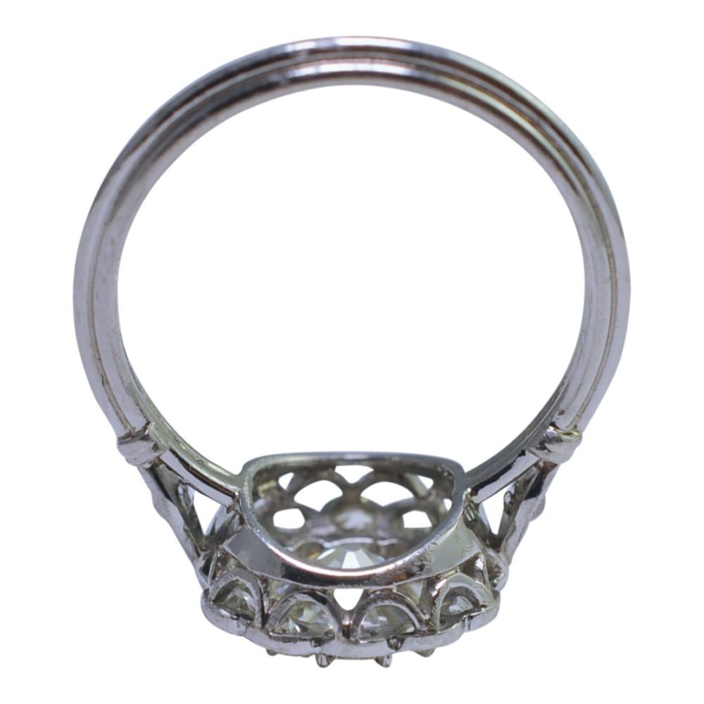 Art Deco Diamond Halo Platinum Engagement Ring For Sale 1